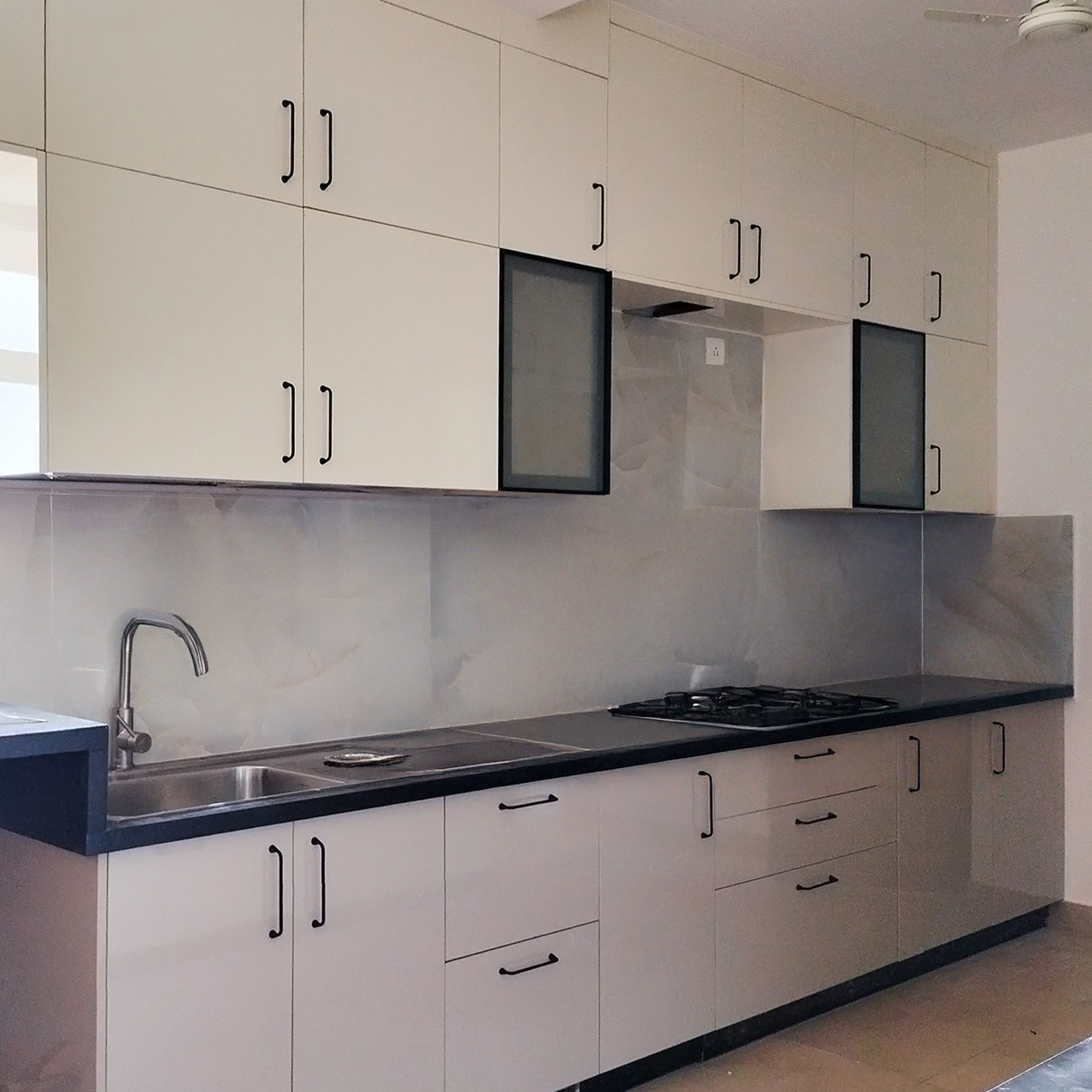 Parallel Kitchen with Beige and Cream Cabinets