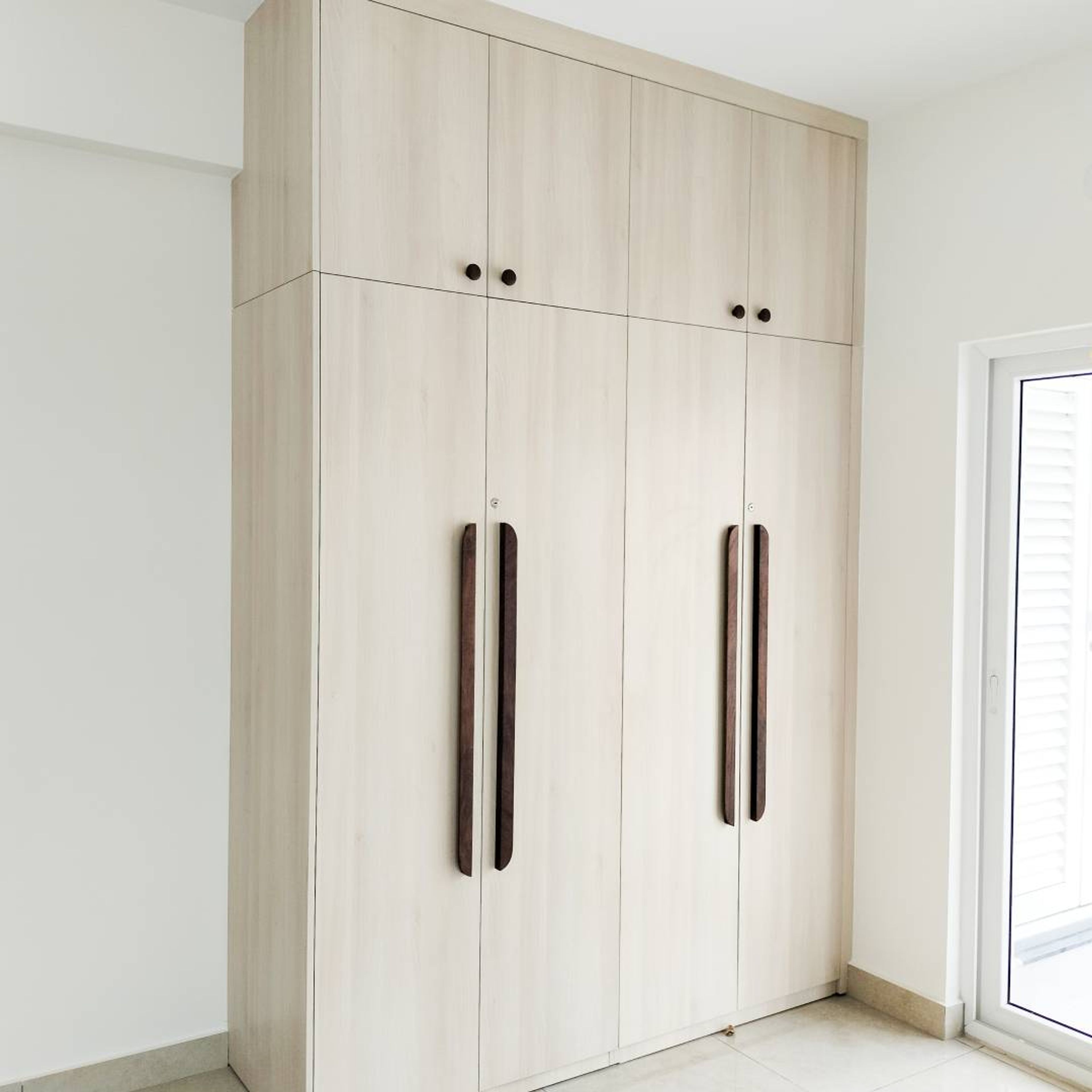 4-Door Light Wood Swing Wardrobe Design