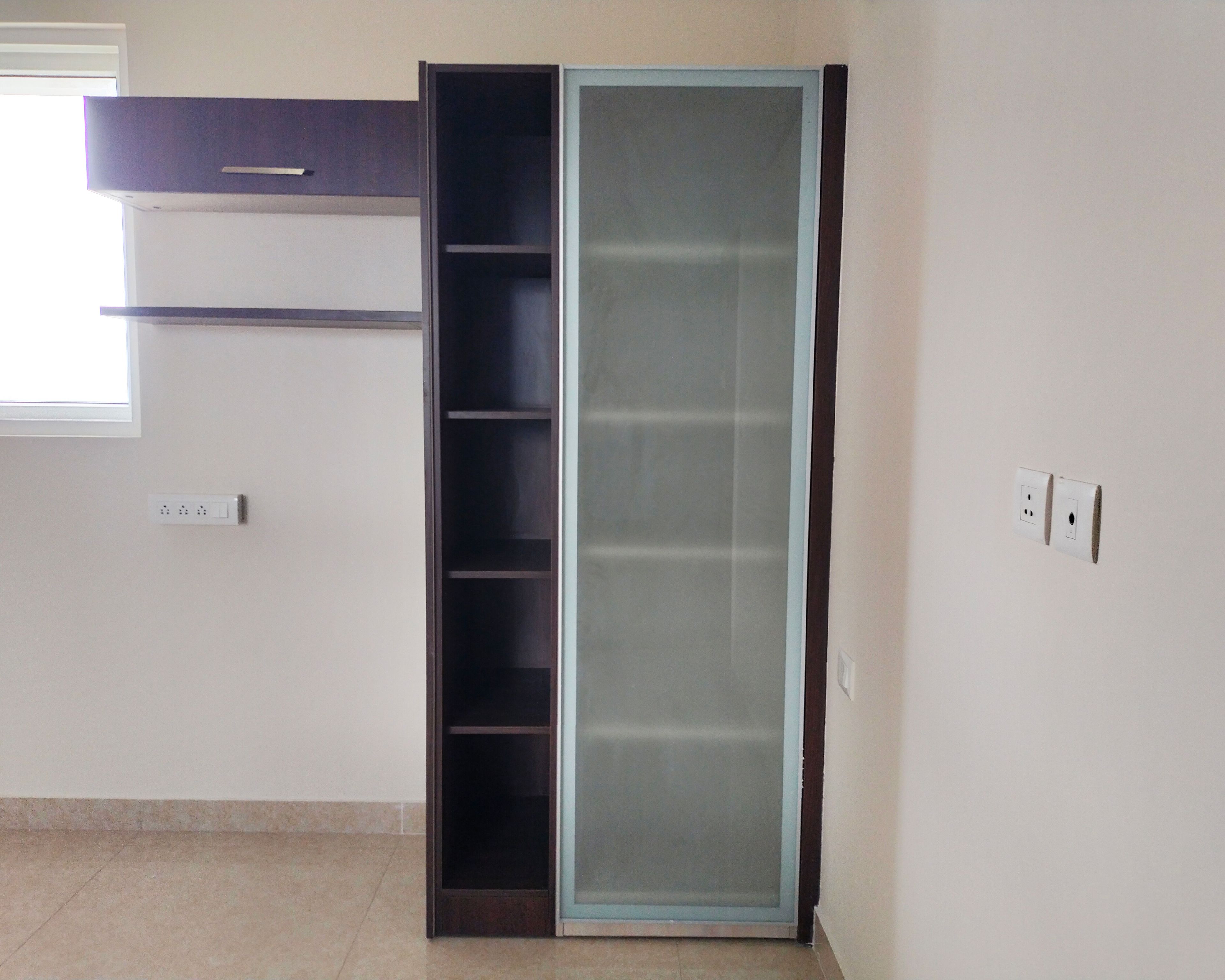 Tall Storage Unit with Translucent Shutter and Open Shelf and Study Unit