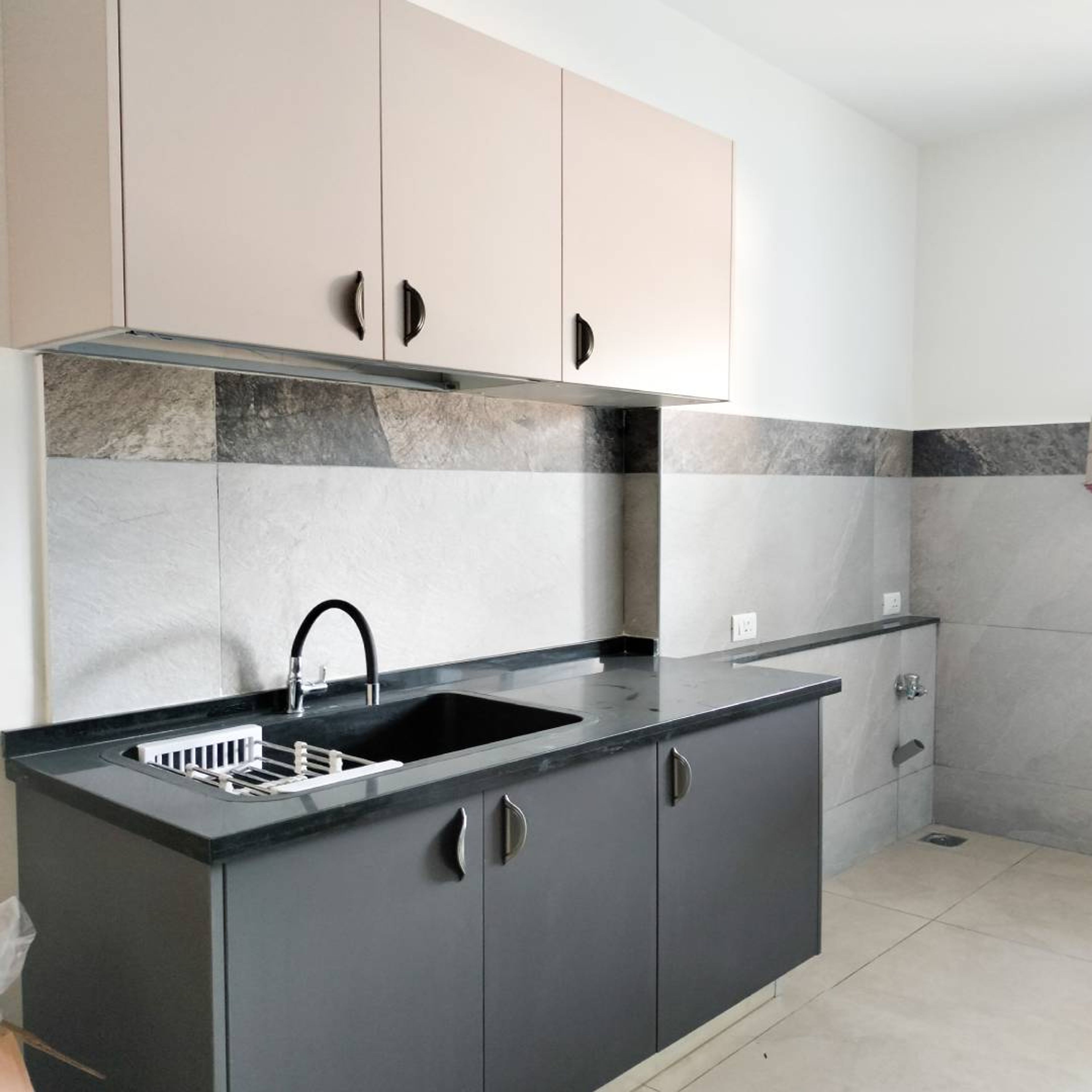 Parallel Kitchen Design With Denim Base And Irish Cream Wall Cabinets