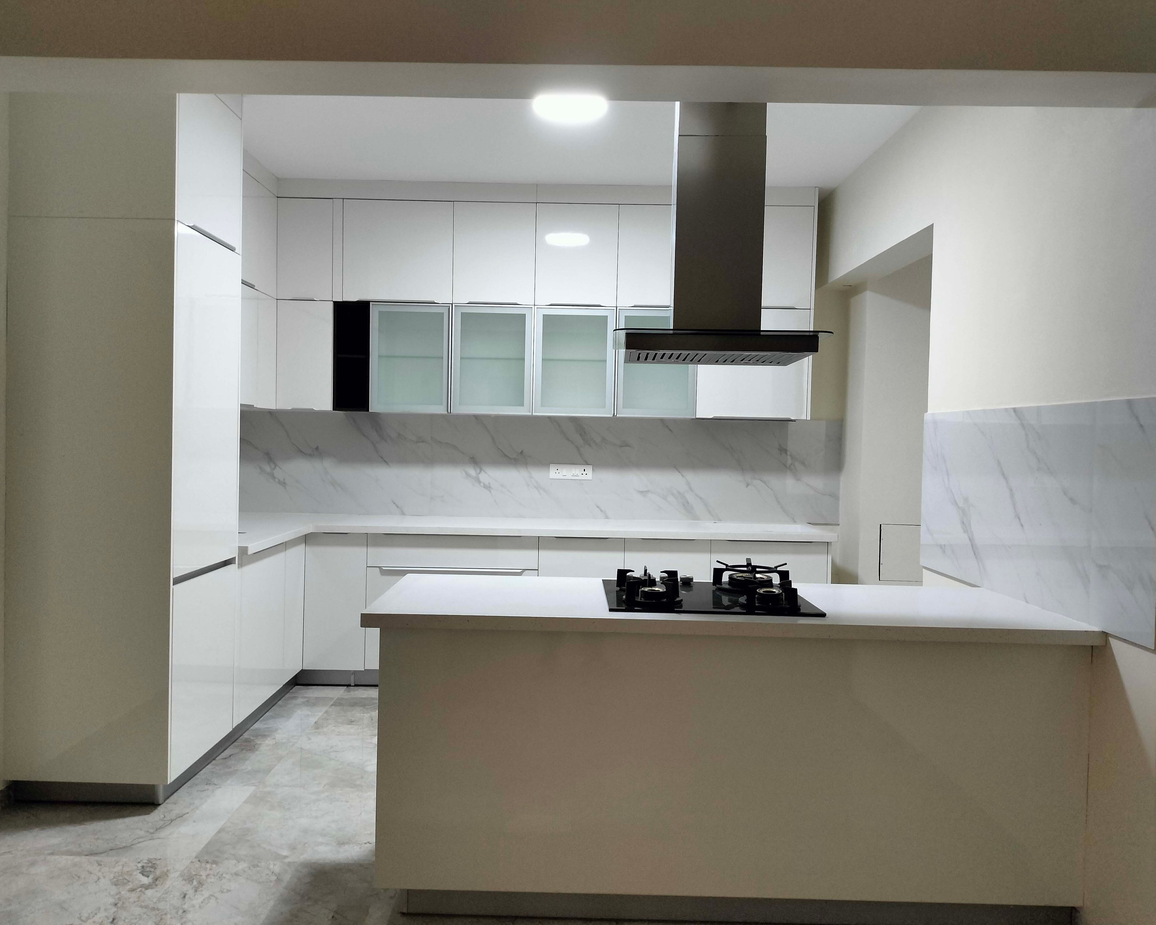 Modern Open Kitchen Design with White Finish and Quartz Countertops