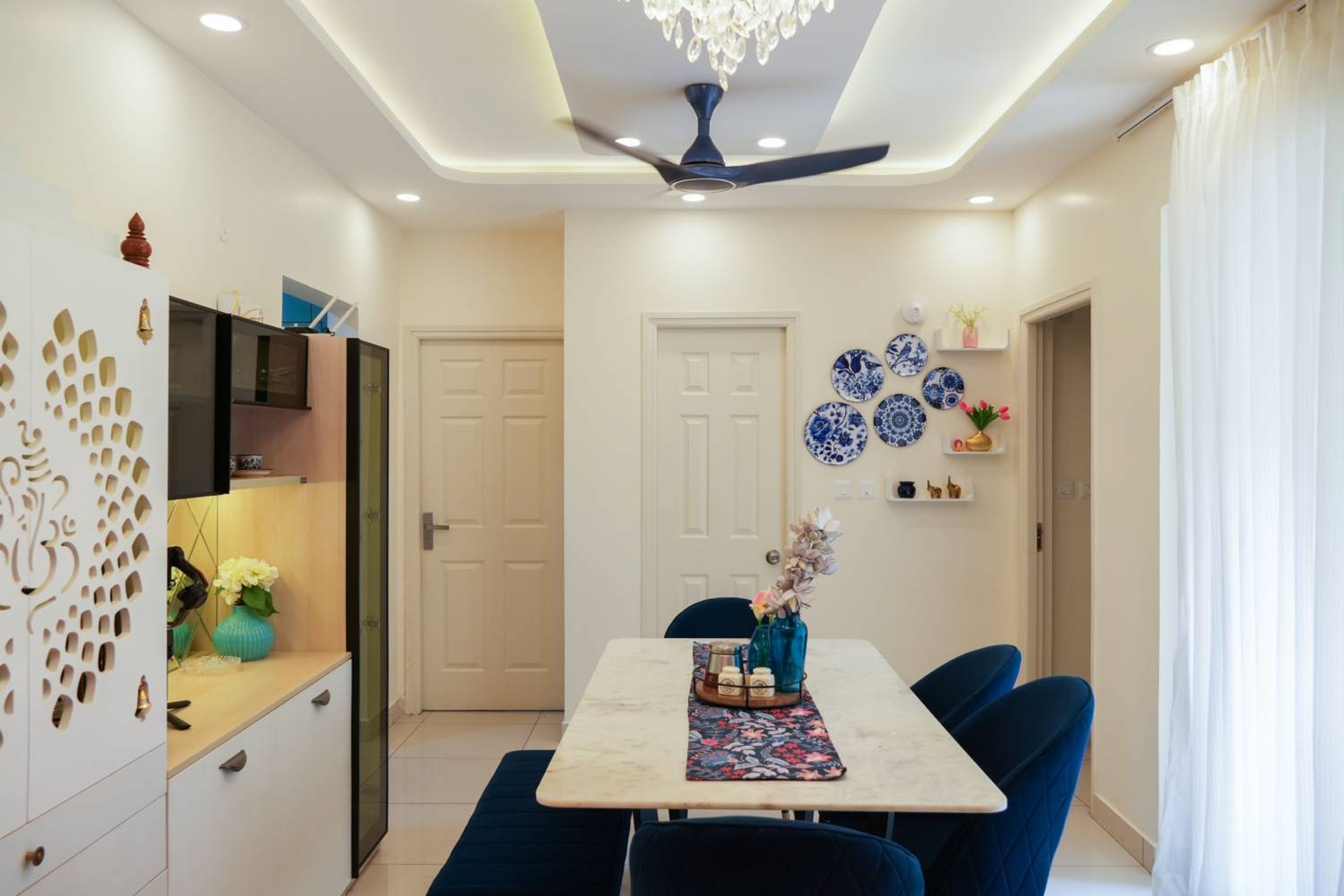 Multi-Layered Modern Peripheral False Ceiling Design With Wooden Texture And Cove Lights