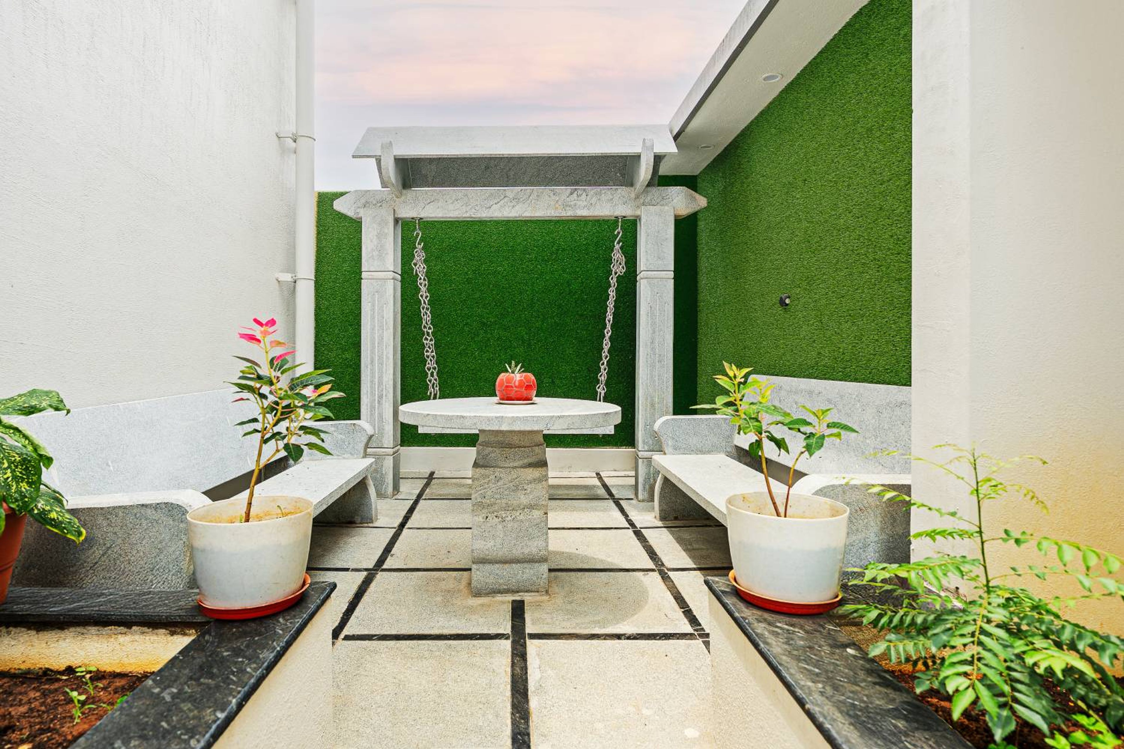 Contemporary Balcony Design with Stone Seating in Bangalore Villa