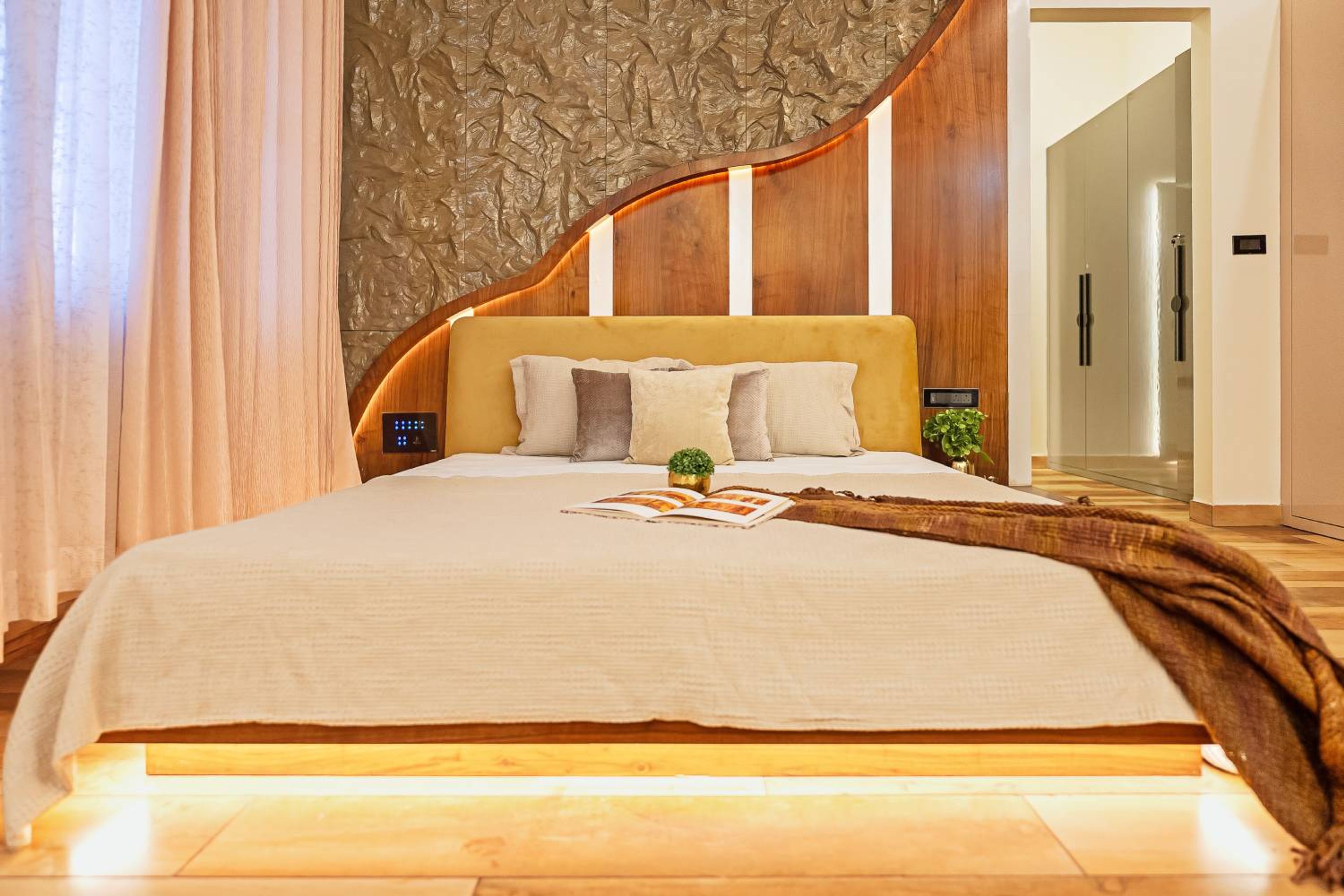 Contemporary Guest Bedroom Design with Mustard Upholstered Headboard Queen Bed