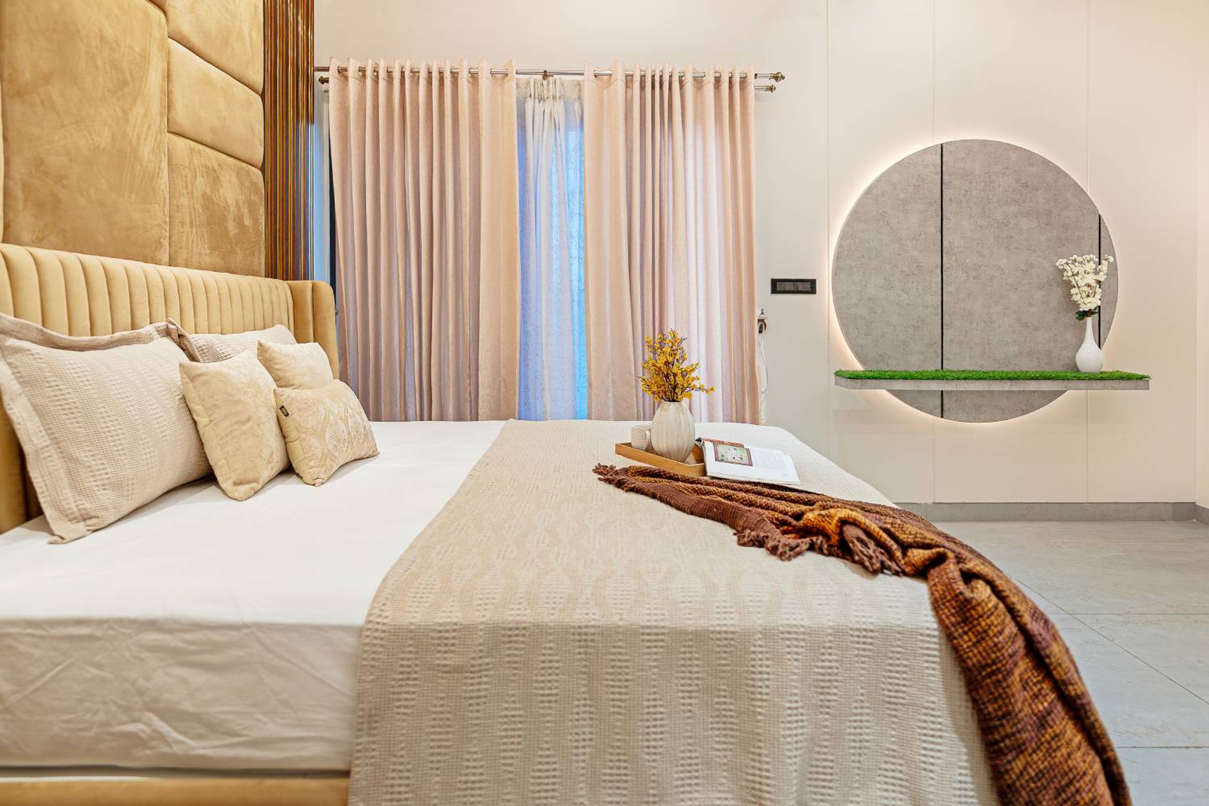 Contemporary Bedroom Design with Round Mirror in Bangalore Villa