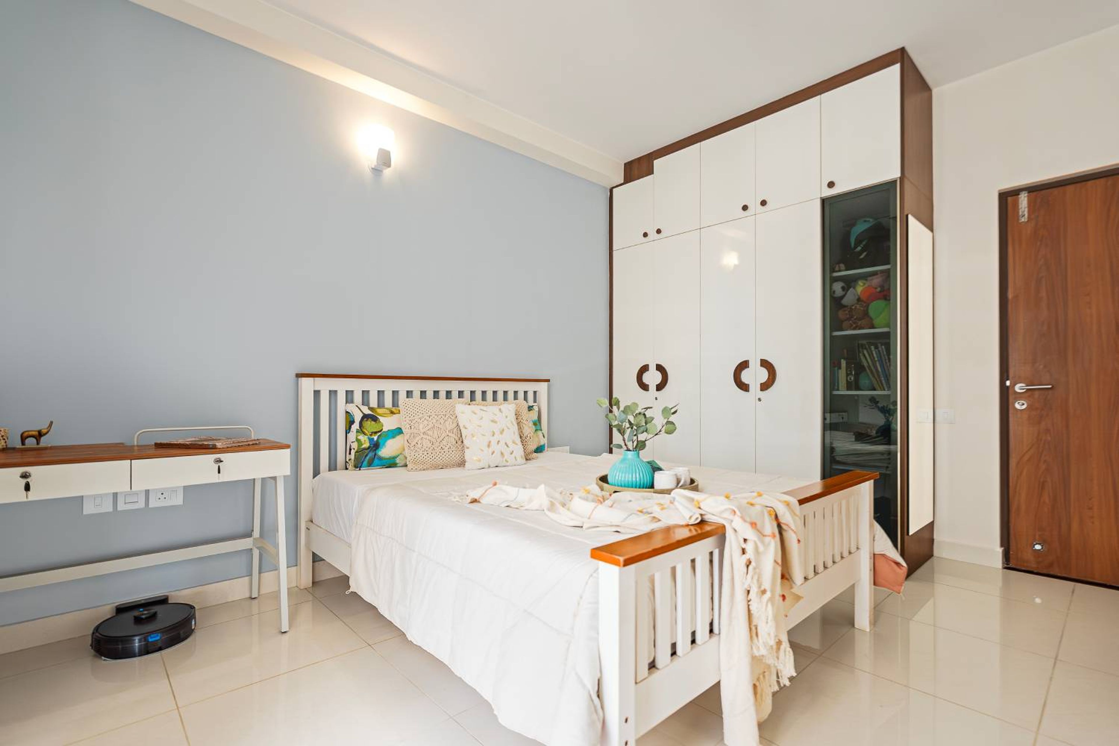 Master Bedroom Design with Wooden King Bed and Blue Wardrobe