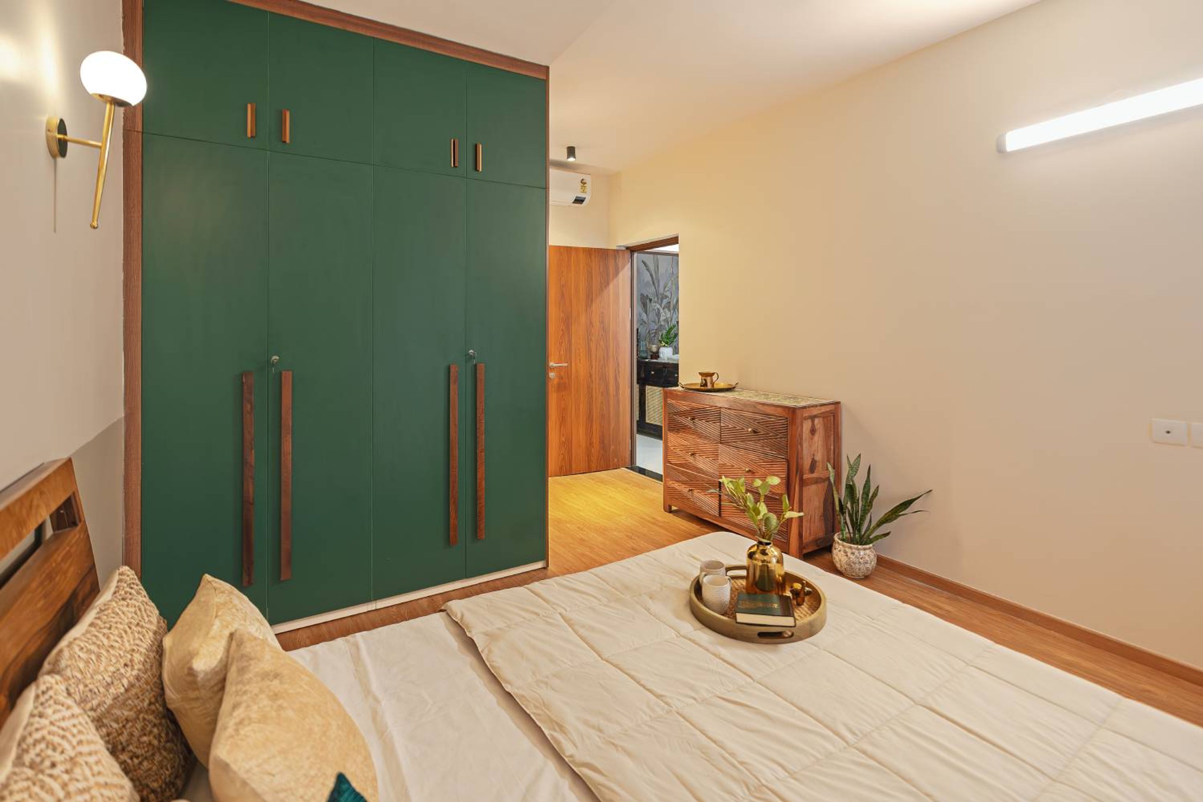 Modern 4-Door Swing Wardrobe Design with Tall Handles and Overhead Cabinets