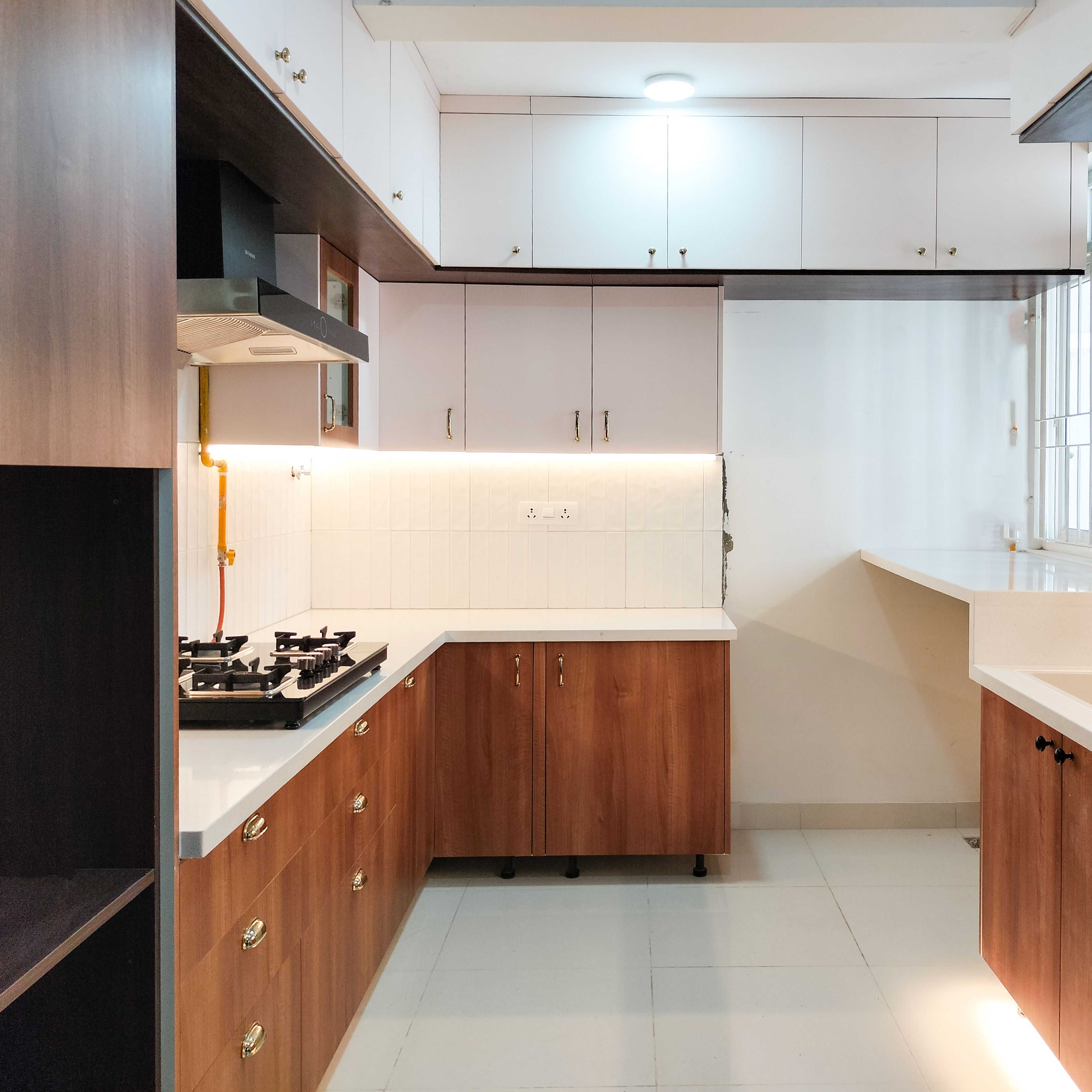 L-Shaped Kitchen Design with Wooden and White Units and White Quartz Countertop