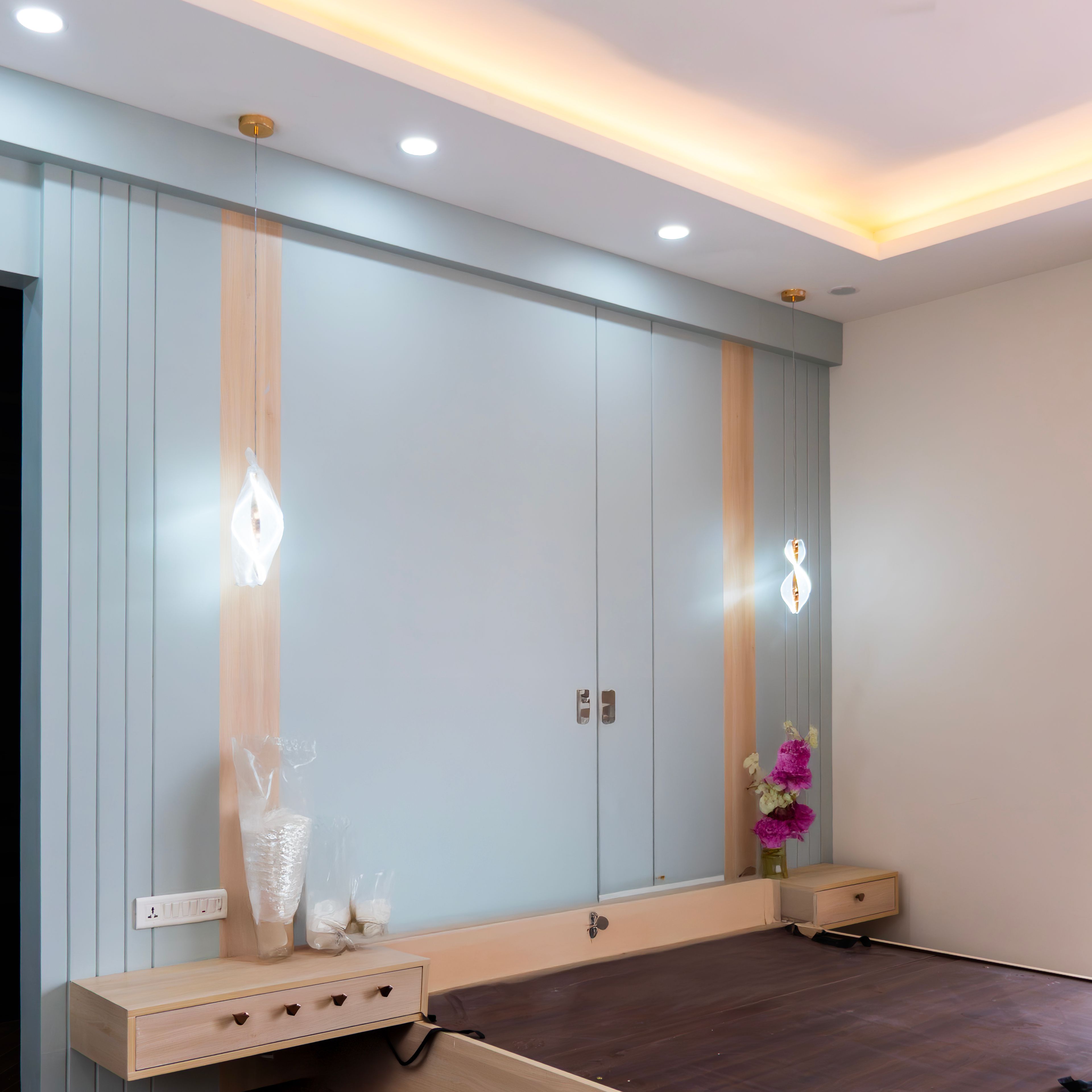 Bedroom Design with Light Blue Headboard Wall Panel and Two Pendant Lights