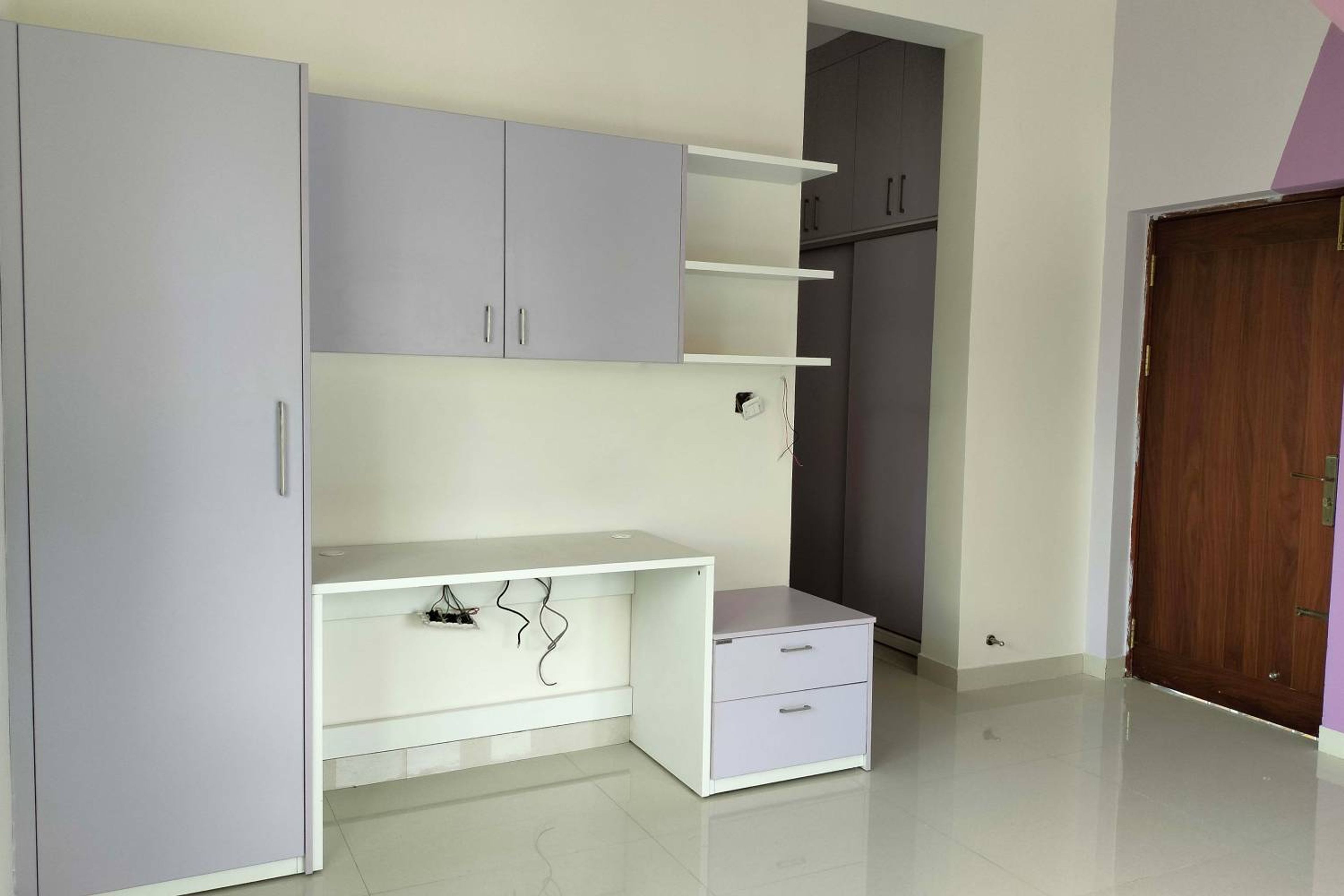 Contemporary Home Office Design with Modular Storage and Work Desk