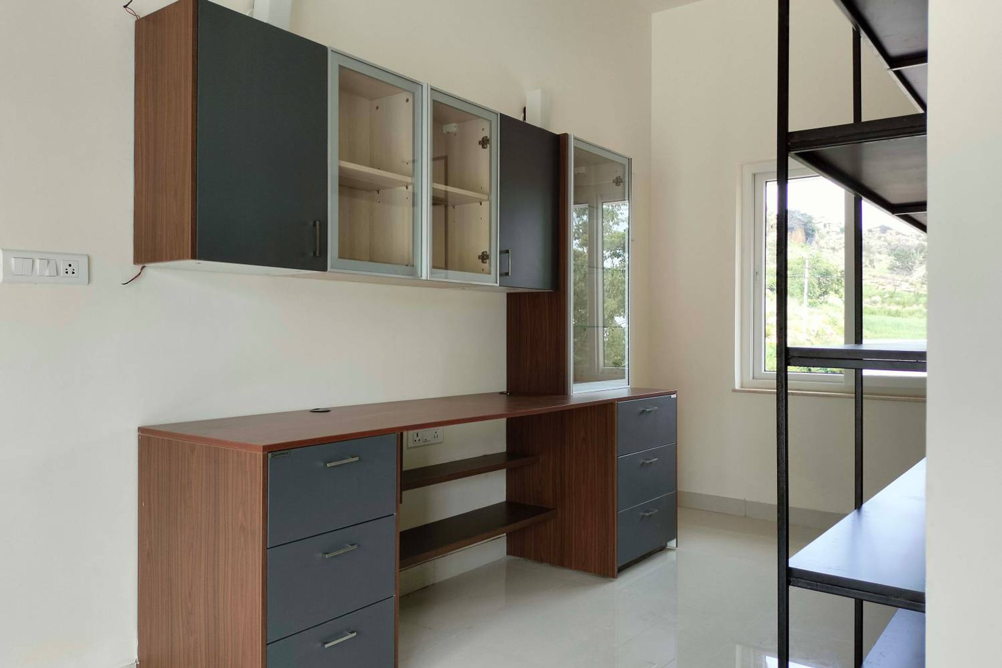 Home Office Design Featuring Cabinet Storage and Wide Work Desk