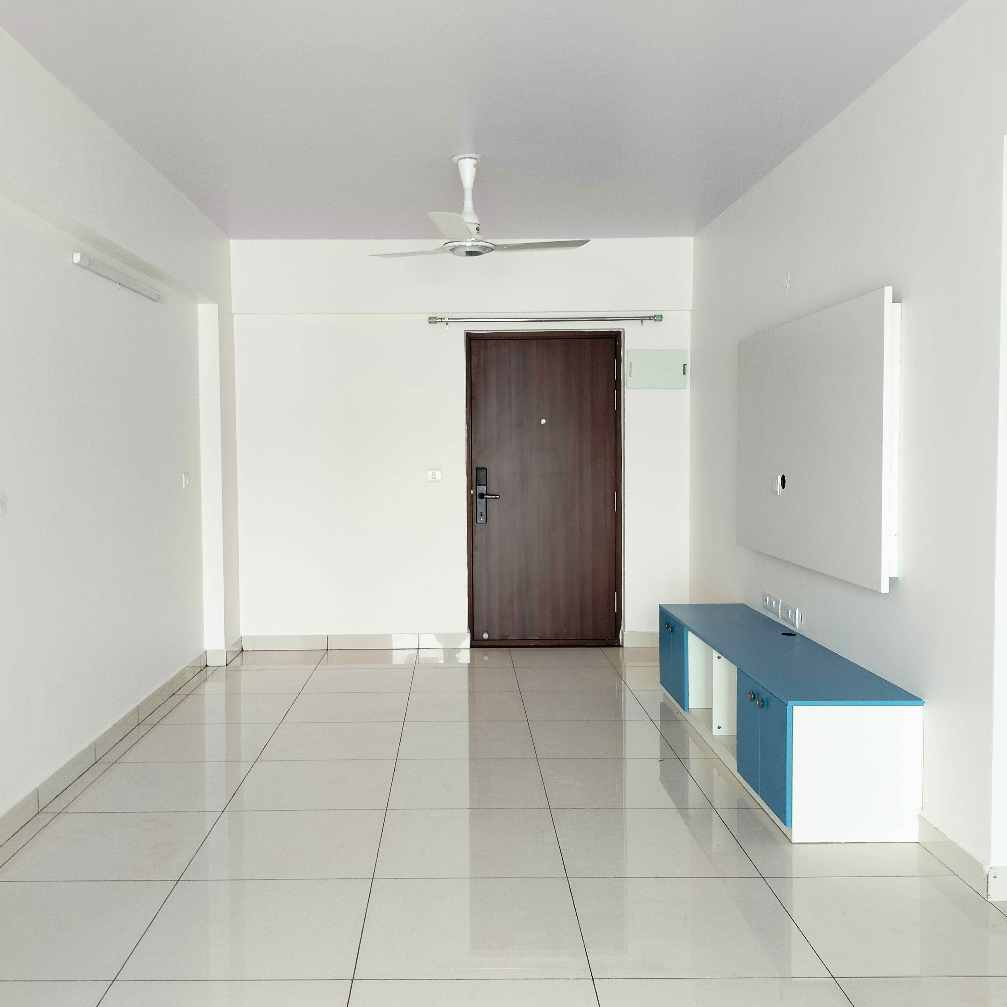 Living Room Design with White and Blue TV Unit