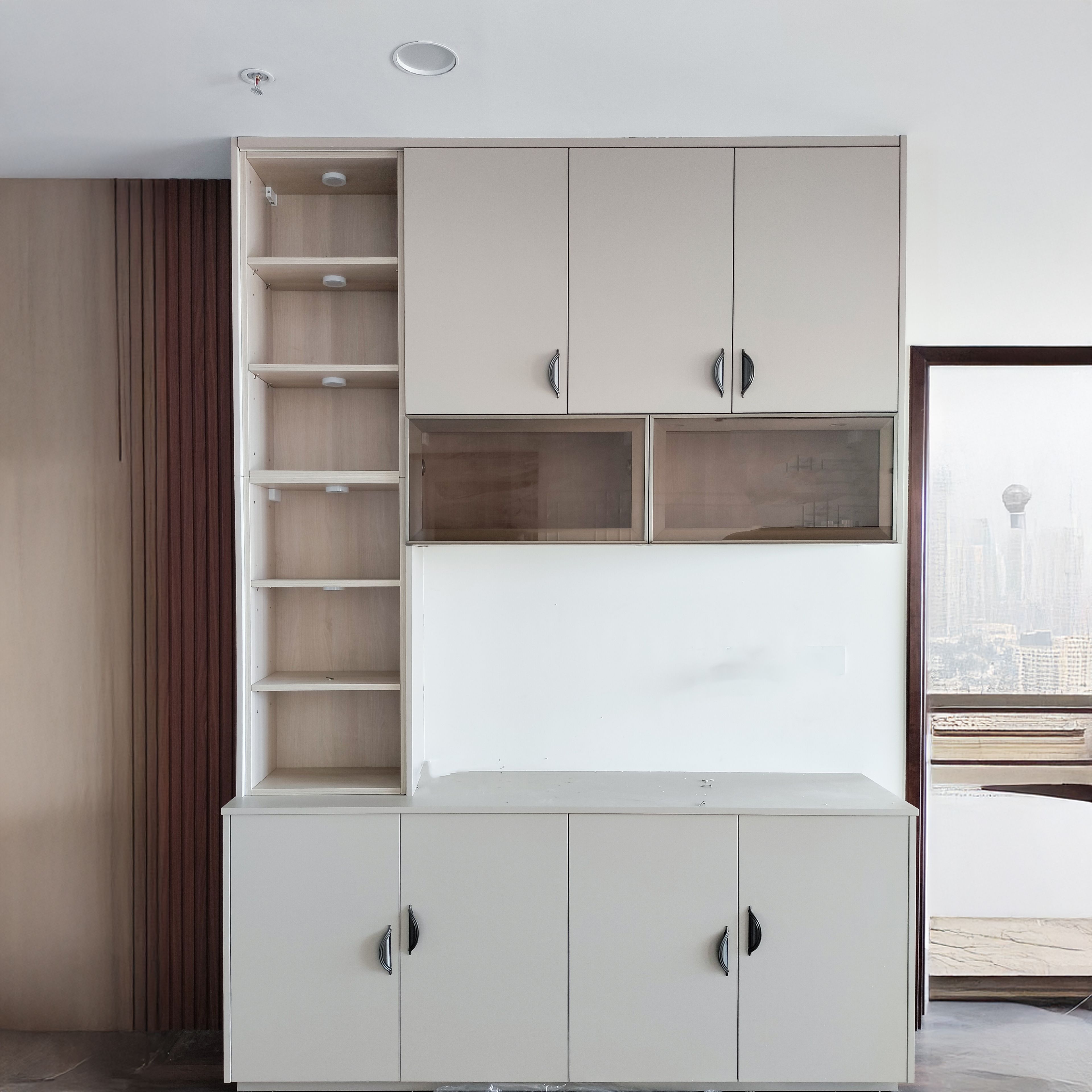 Crockery Unit Design with Beige Units and Tall Open Shelf