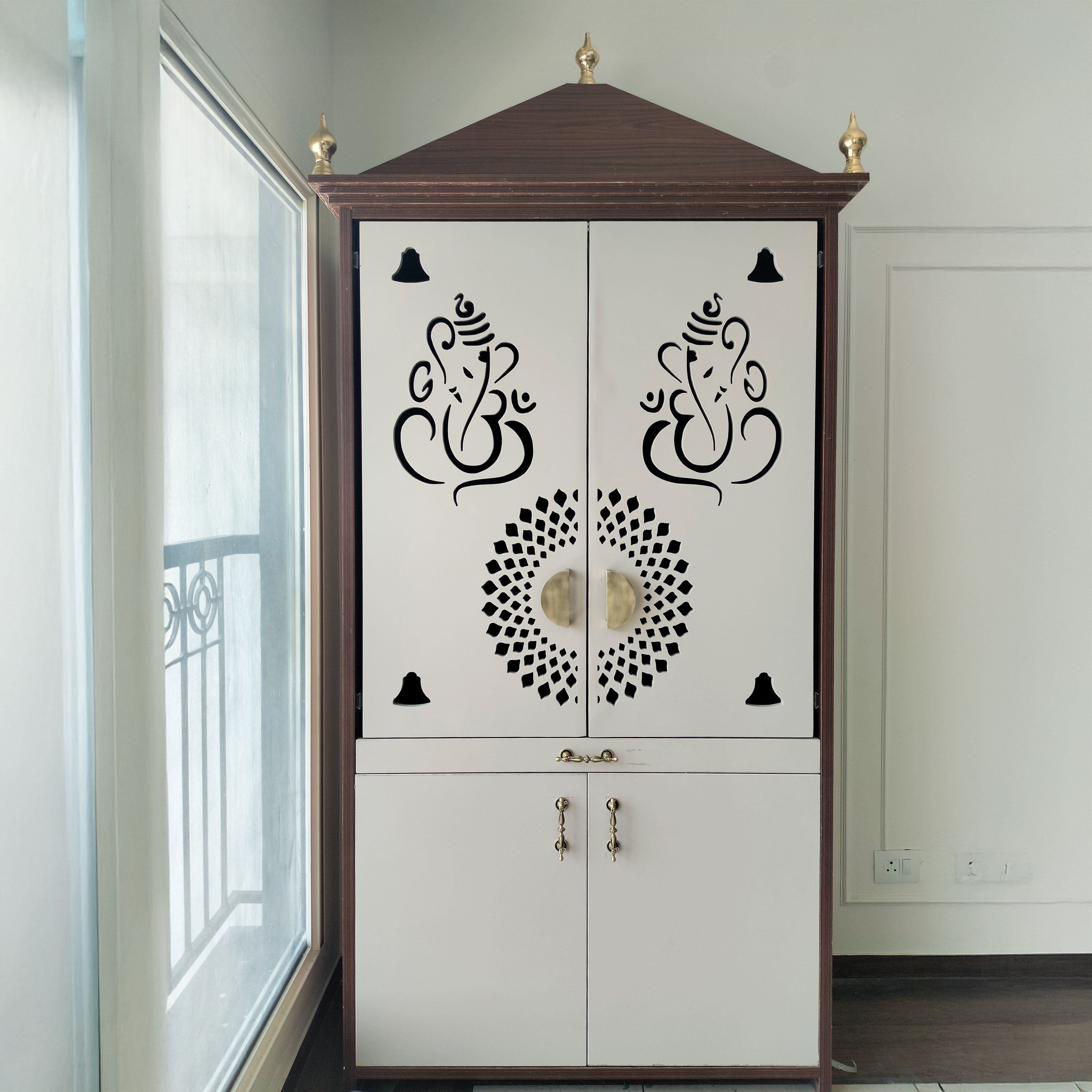 Pooja Unit Design with CNC Cut Ganesha on the Cream Door