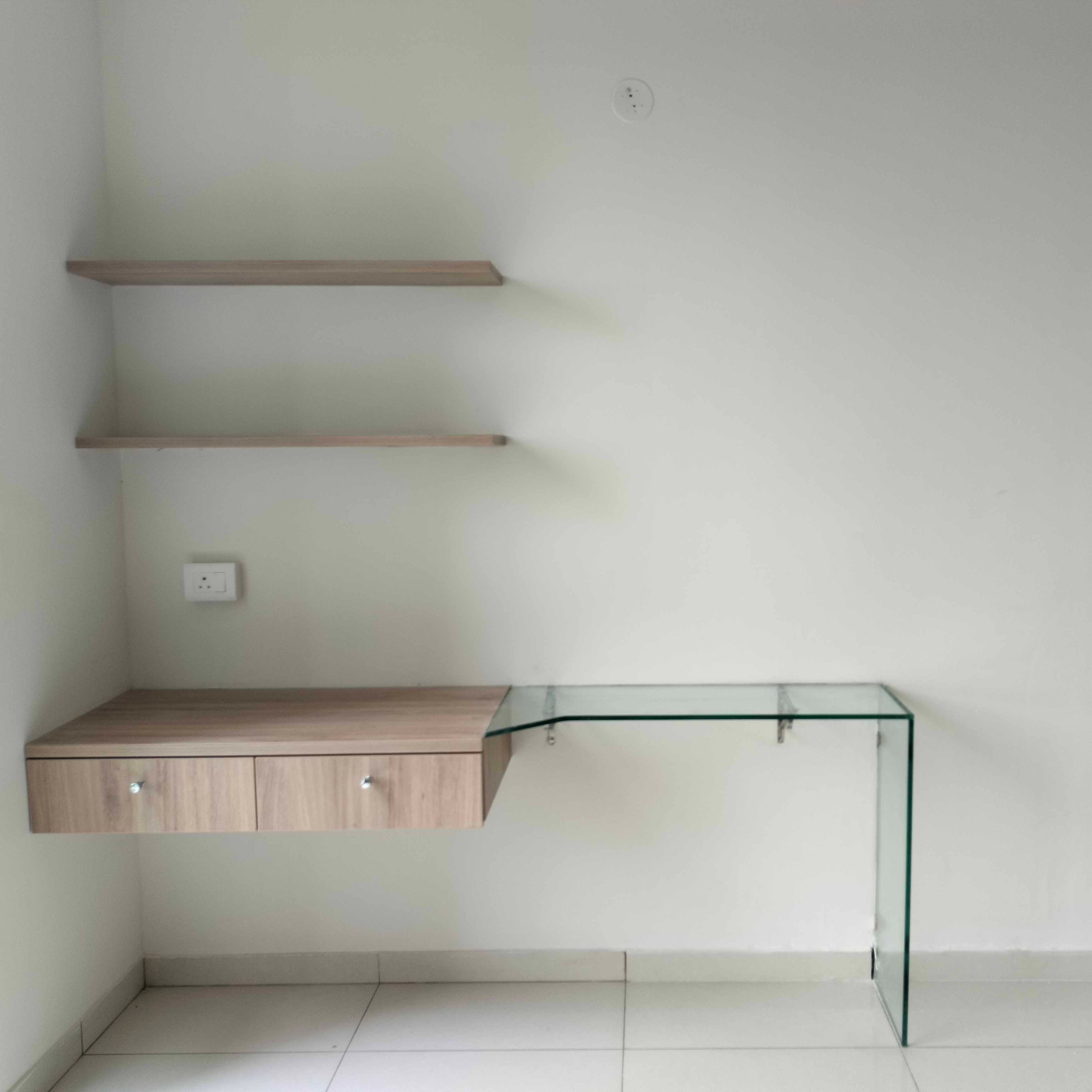 Study Space with Wall Mounted Wood and Glass Desk and Wooden Shelves