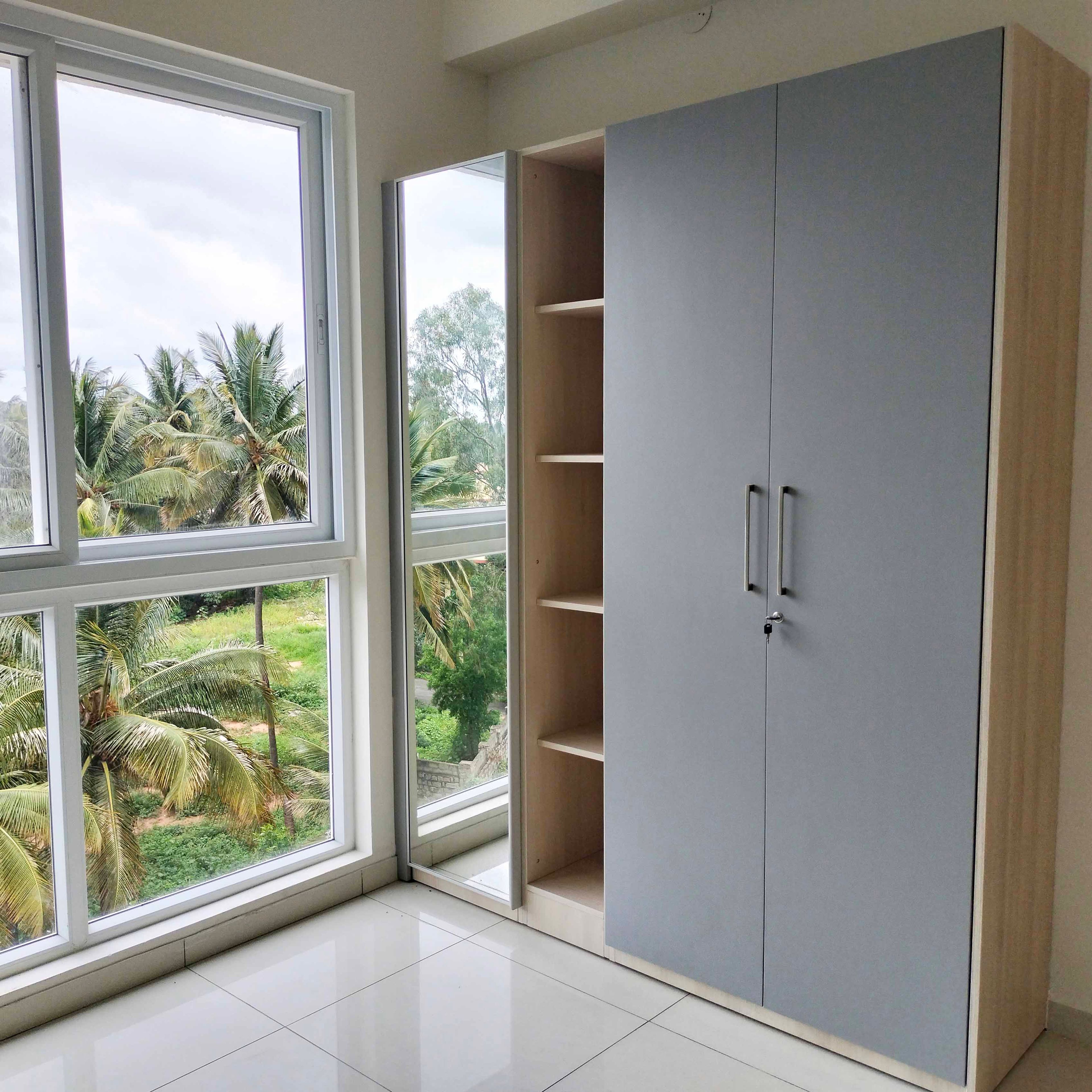 Grey 3-Door Swing Wardrobe Design with Integrated Mirror and Open Tall Unit