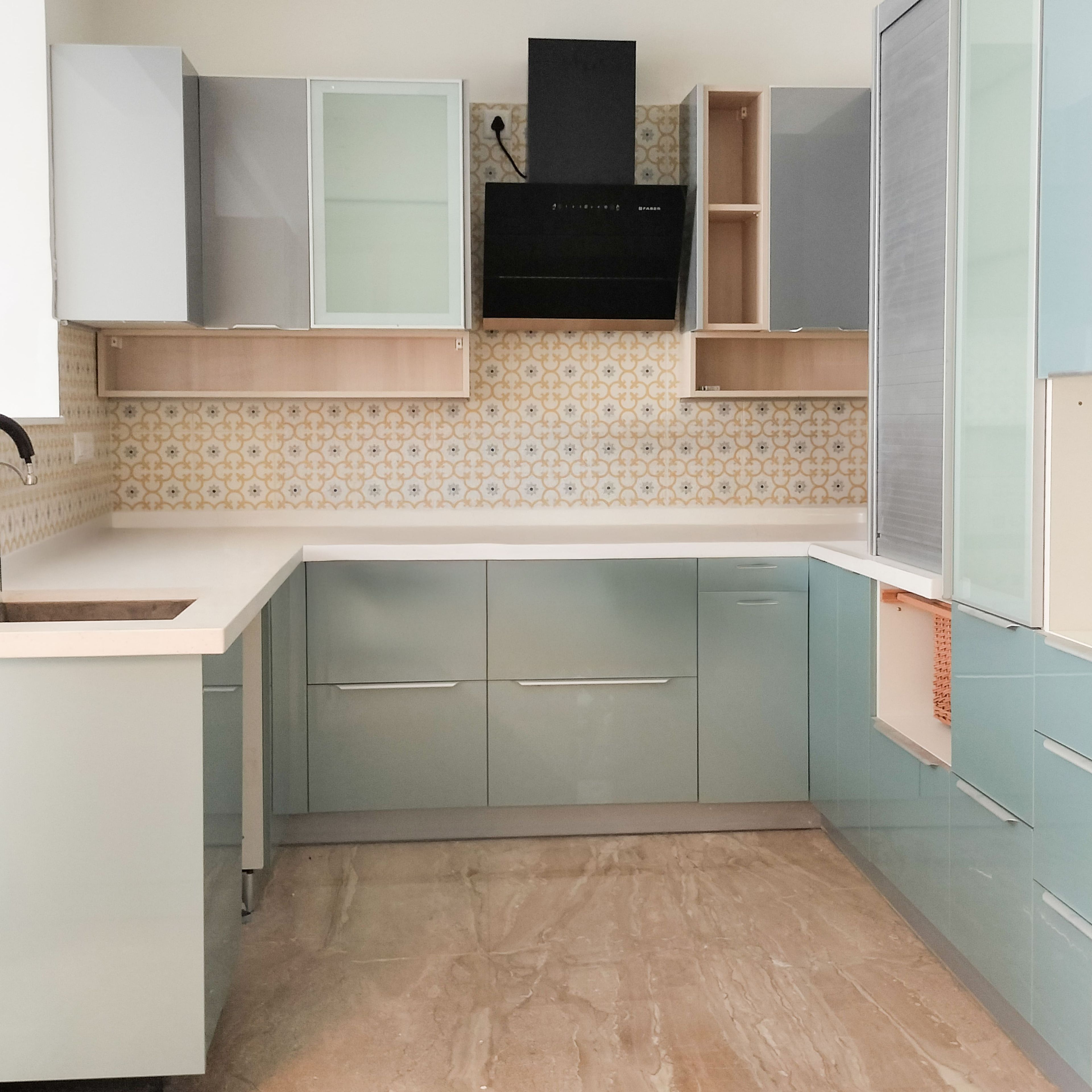 U-Shaped Kitchen Design with Light Blue and Grey Units and Quartz Countertop