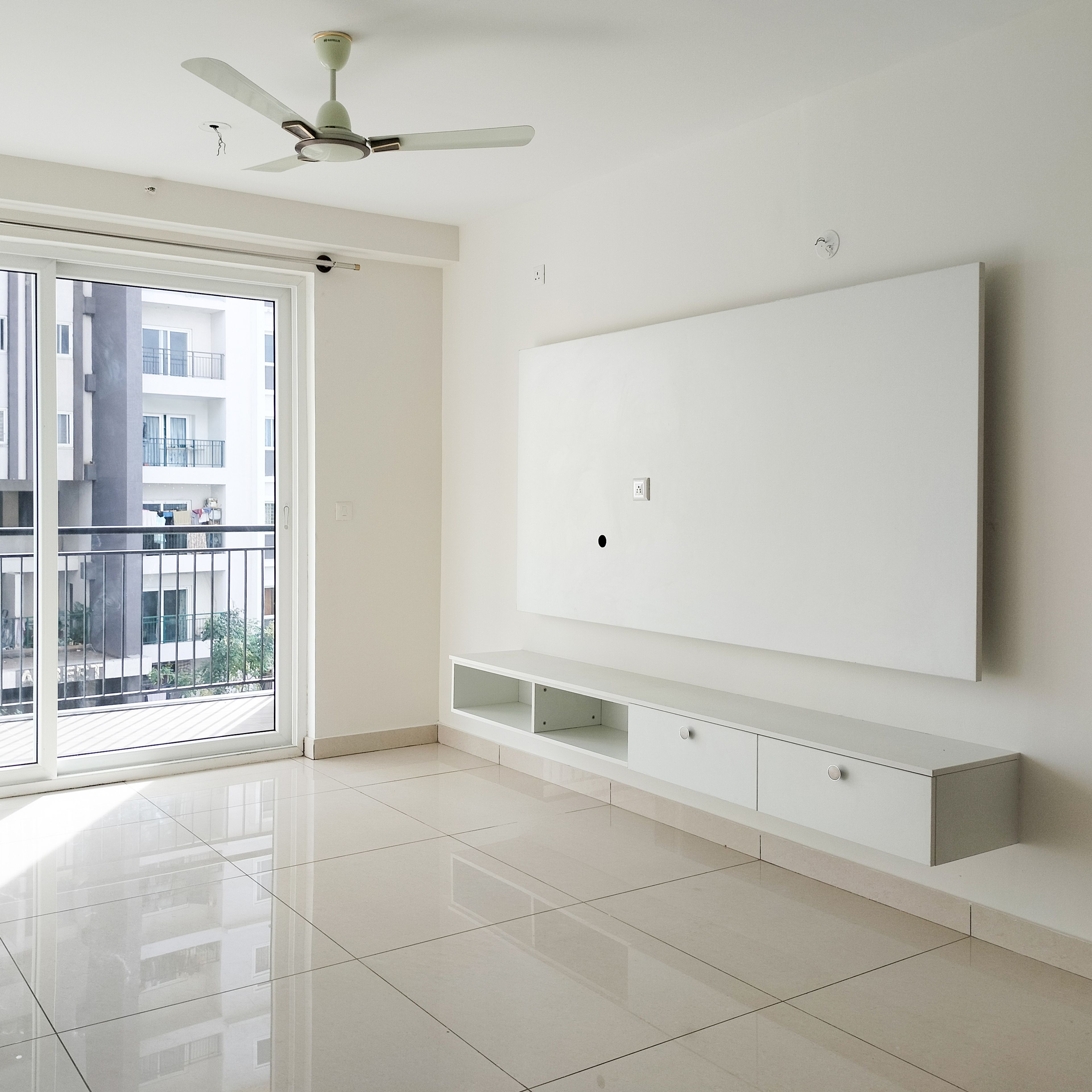 White TV Unit Design with Floating Drawers