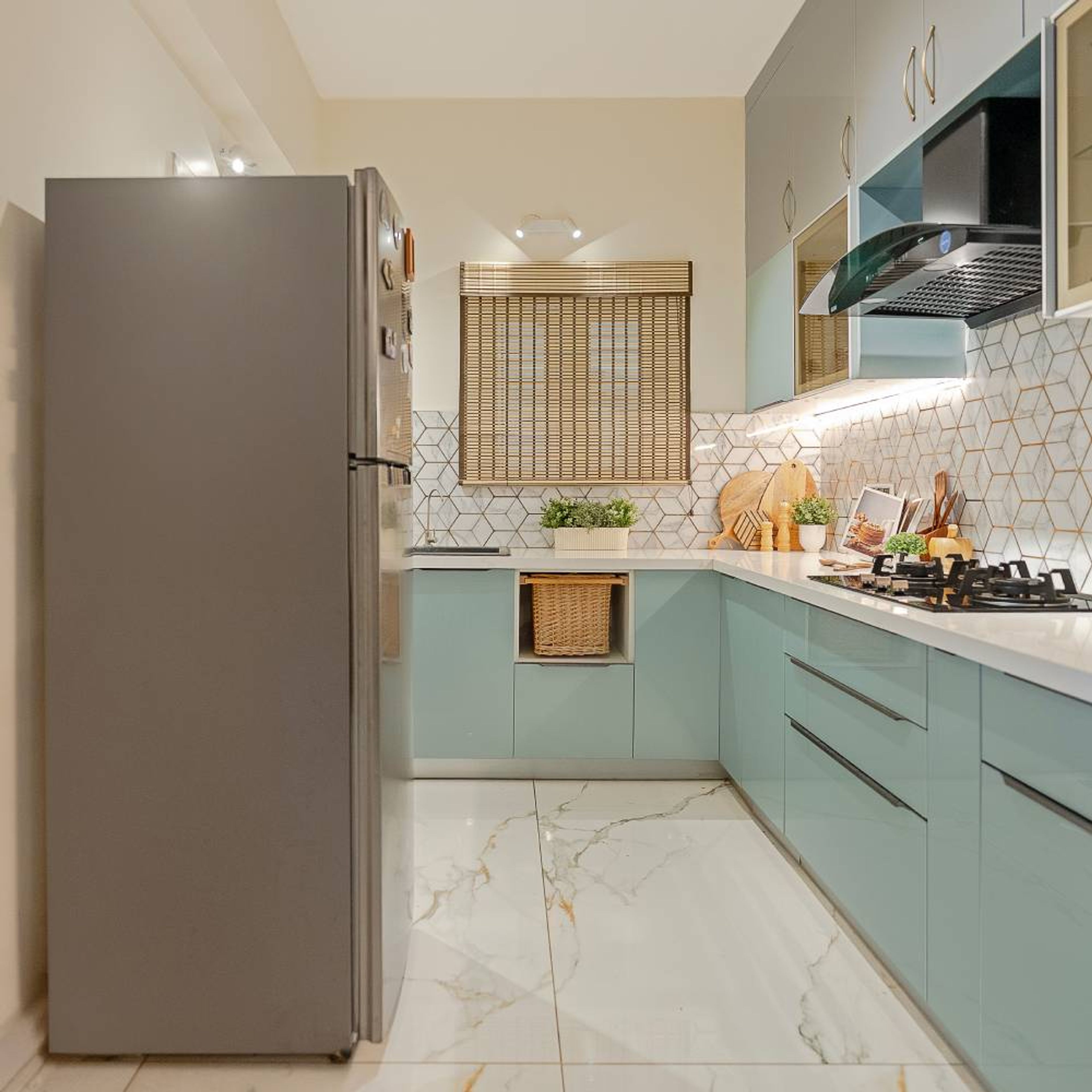 L-Shaped Modern Kitchen Design with Blue and Silver Cabinets, Gold Backsplash and Granite Countertop