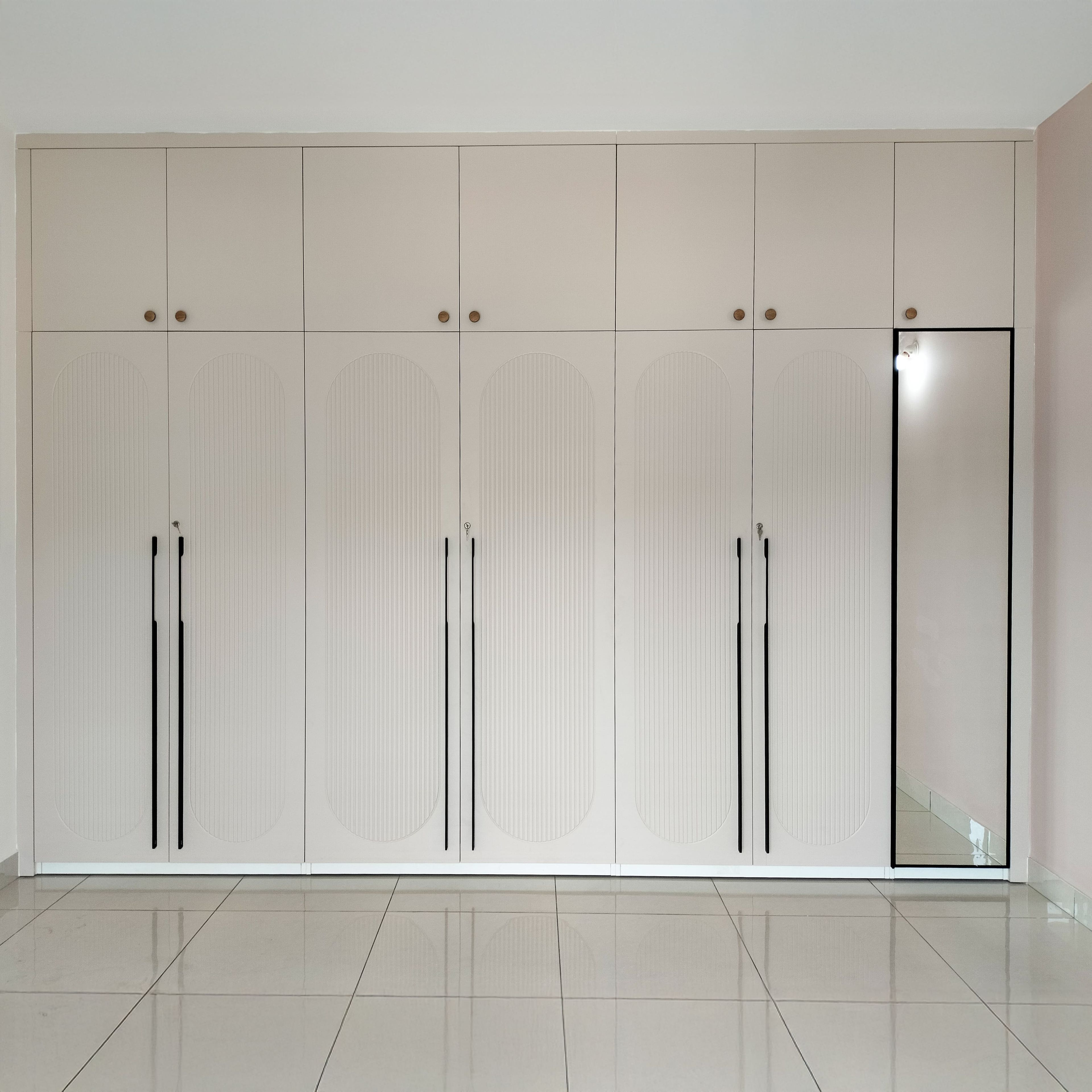 6-Door Beige Swing Wardrobe Design with Attached Mirror and Loft Unit