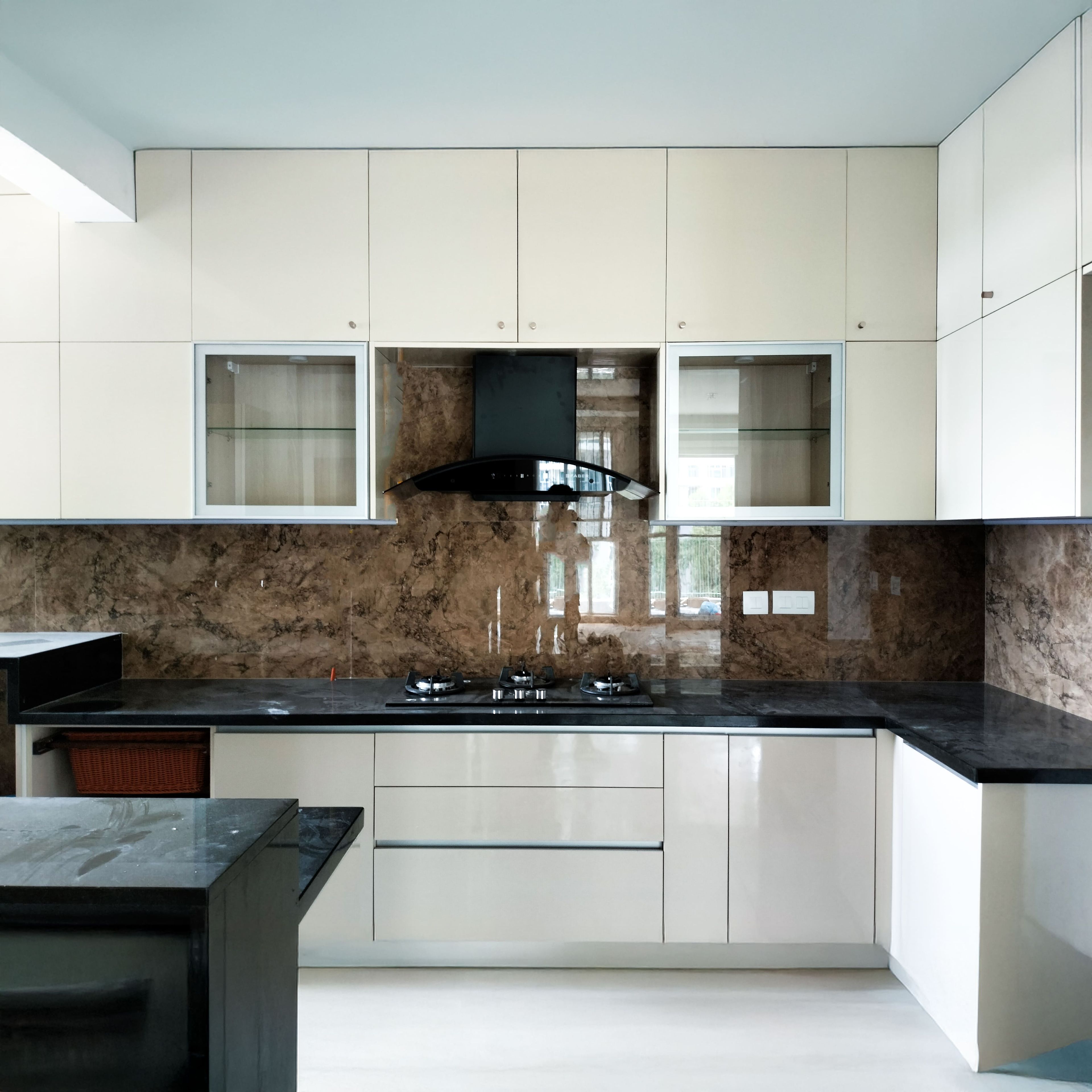 L-Shaped Kitchen Design with Off-White Units with Granite Countertop
