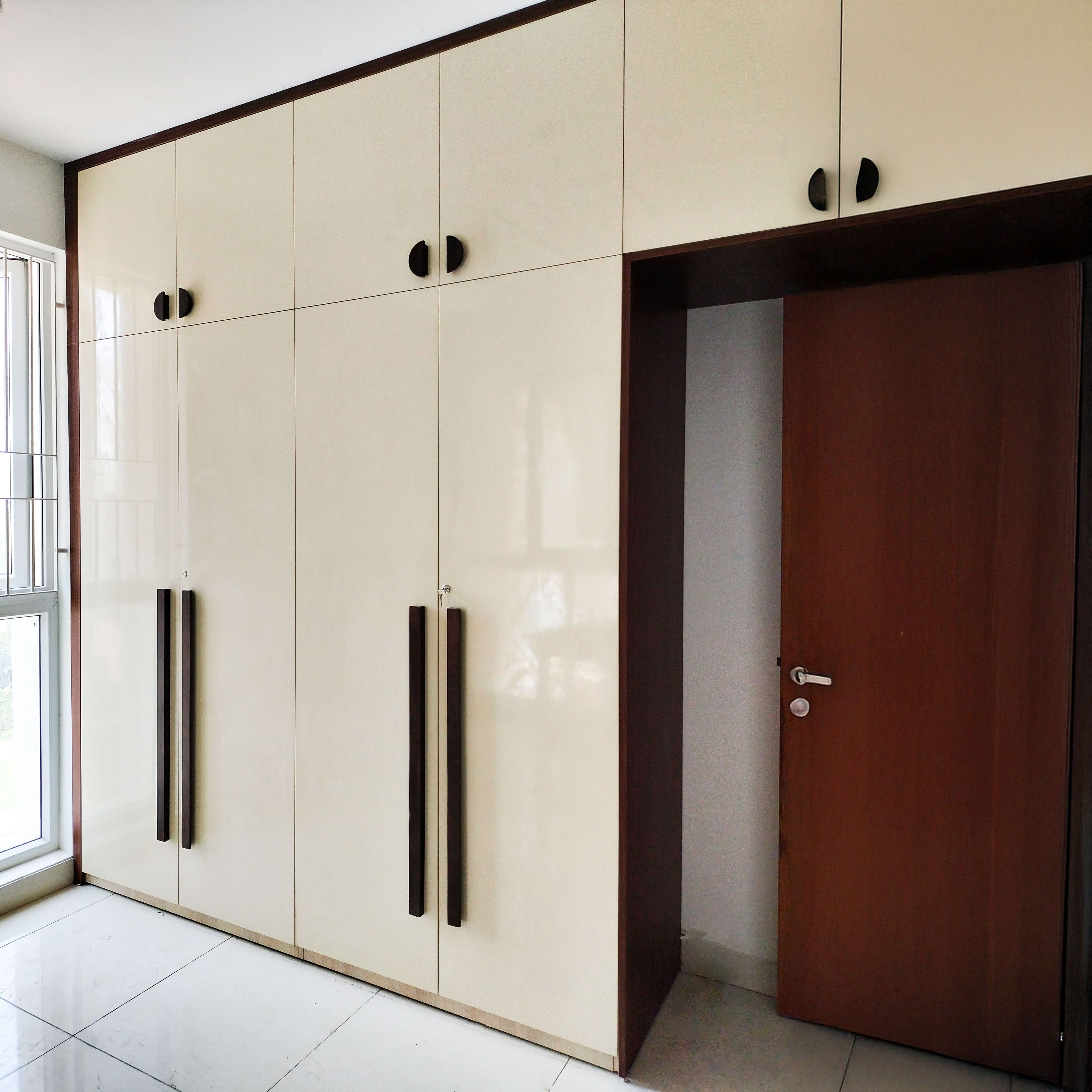4-Door Off-White Swing Wardrobe Design with Loft Unit