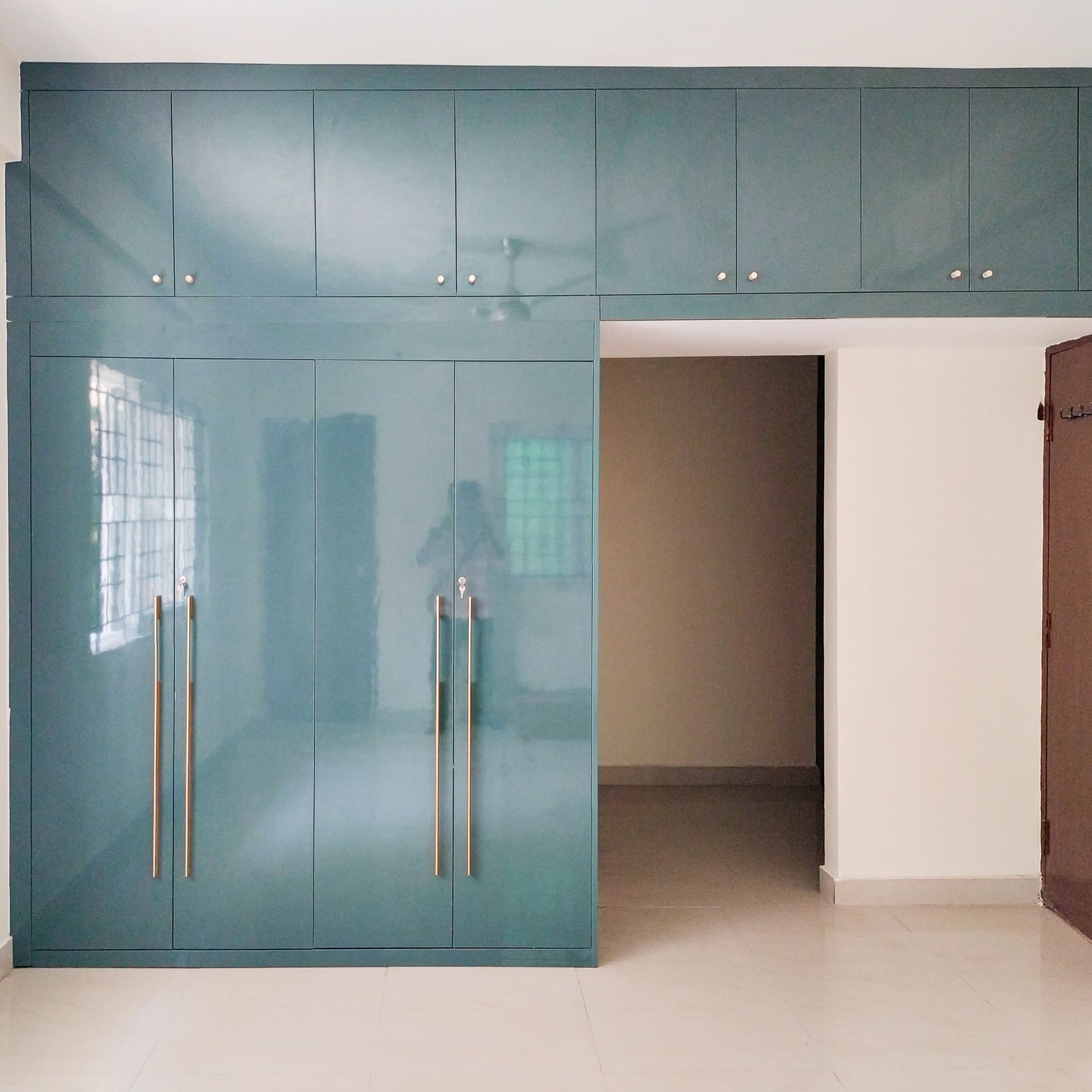 4-Door Green Swing Wardrobe Design