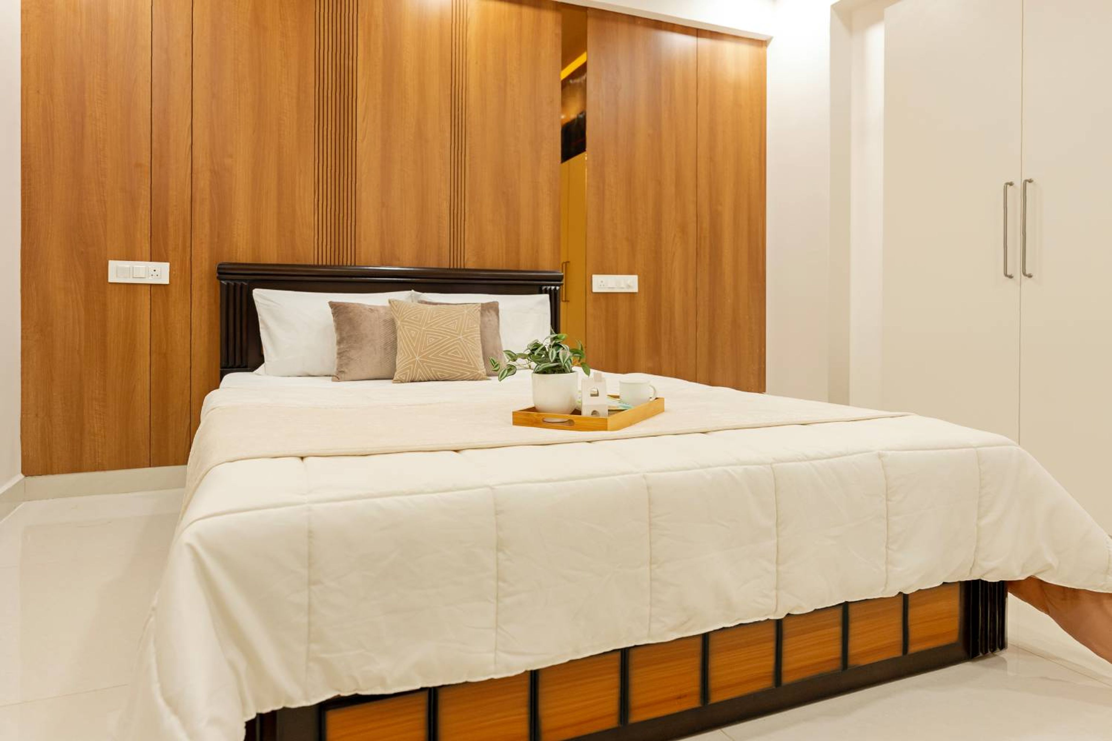 Contemporary Warm Wooden Brown Wall Design with Vertical Panelling for Bedrooms