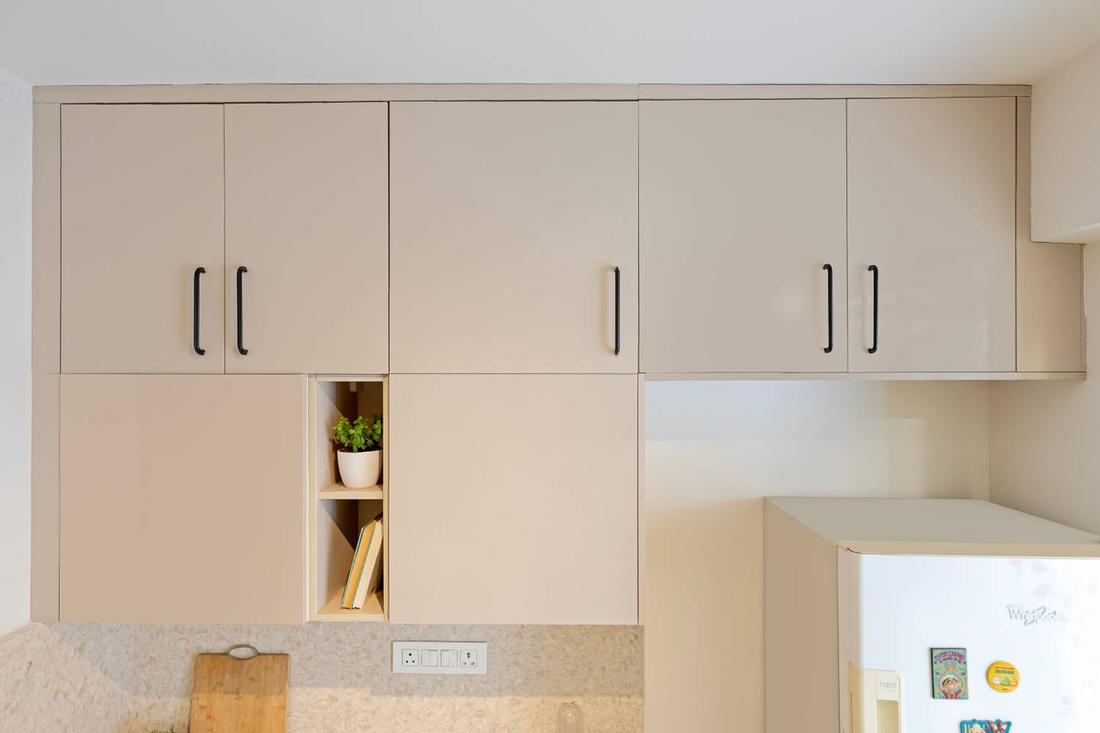 L-Shaped KItchen Design with Beige Wall Units