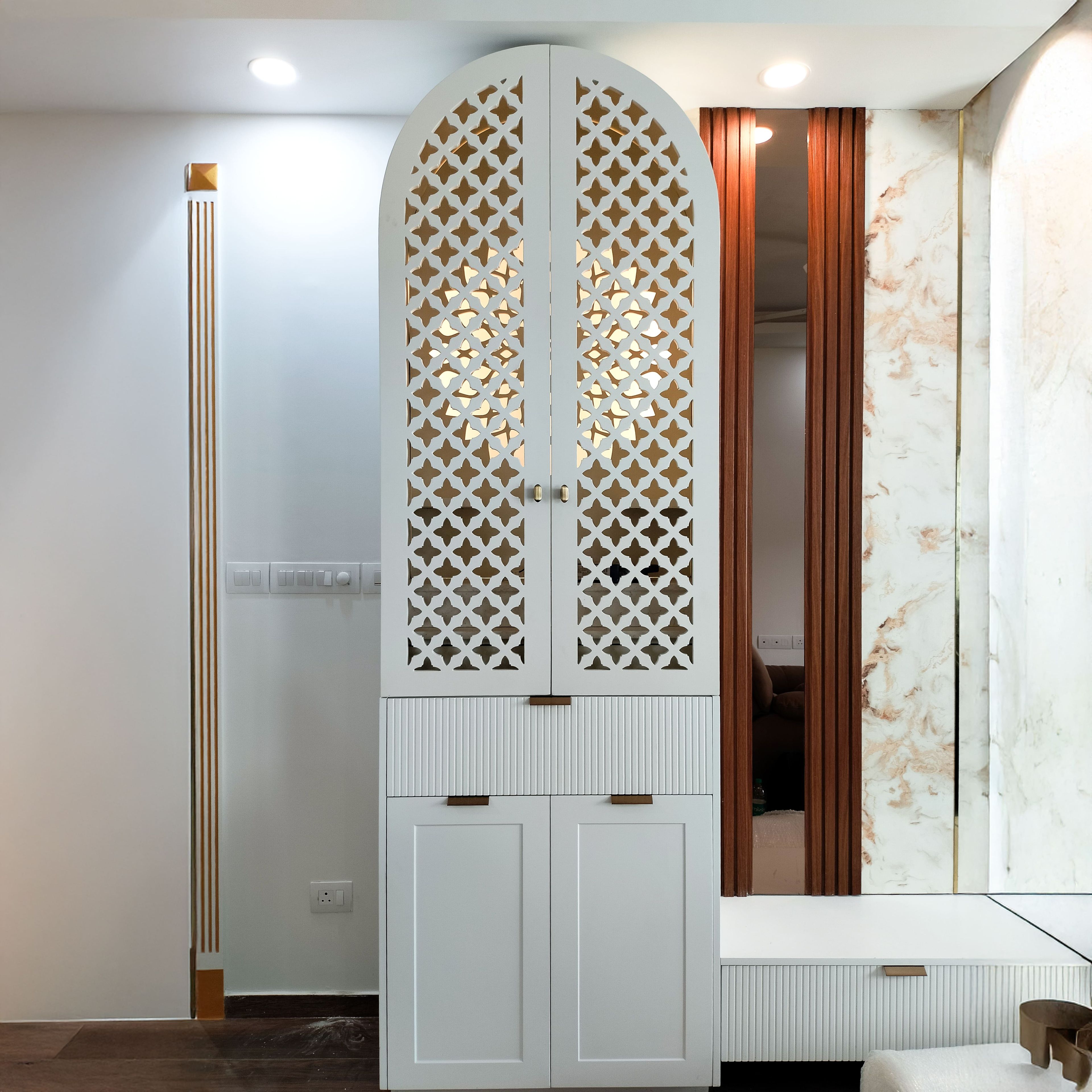 Pooja room design with CNC cut closed door