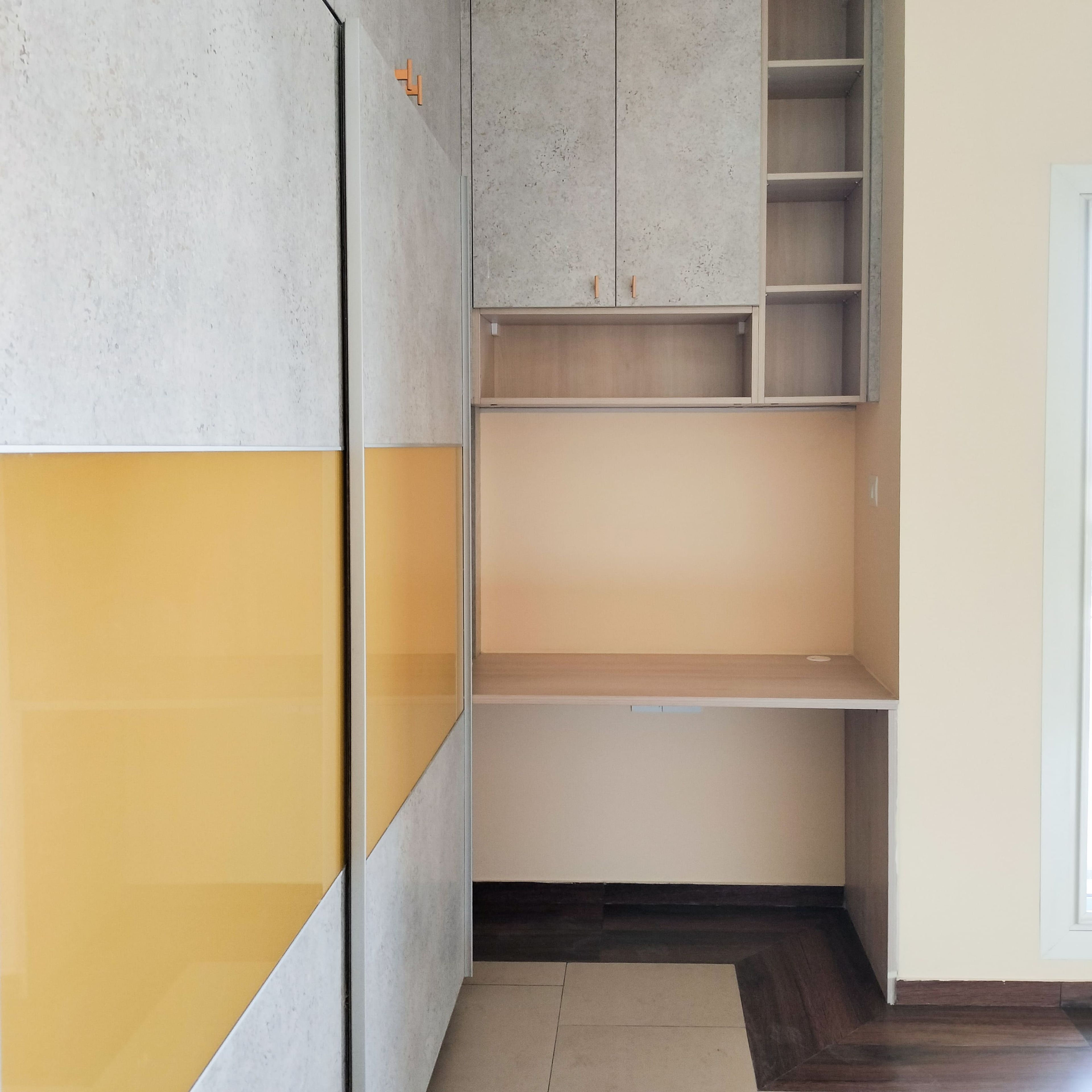 Study space with grey wall shelves