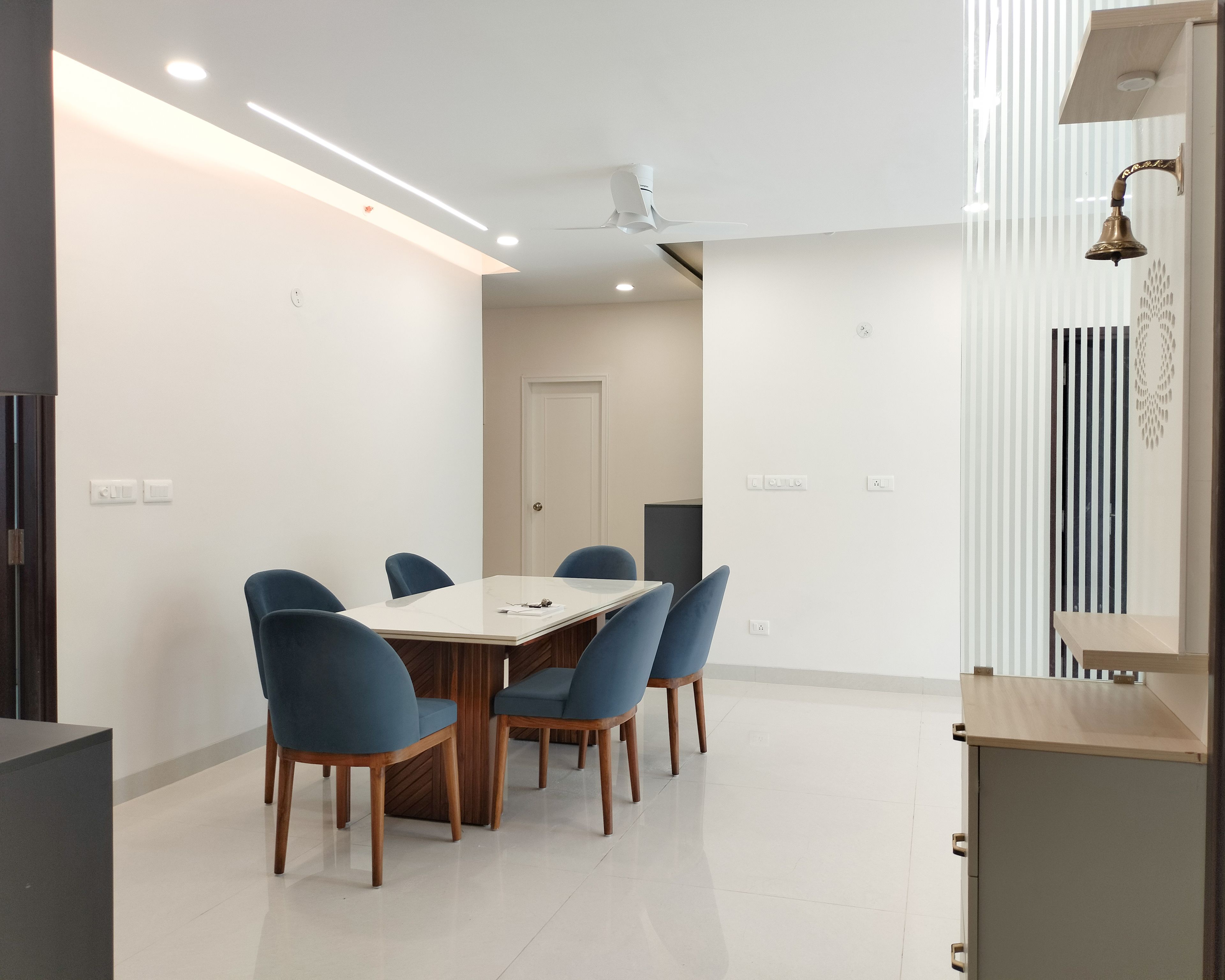 Dining Room Design with 6 Blue Chairs and White Table Top