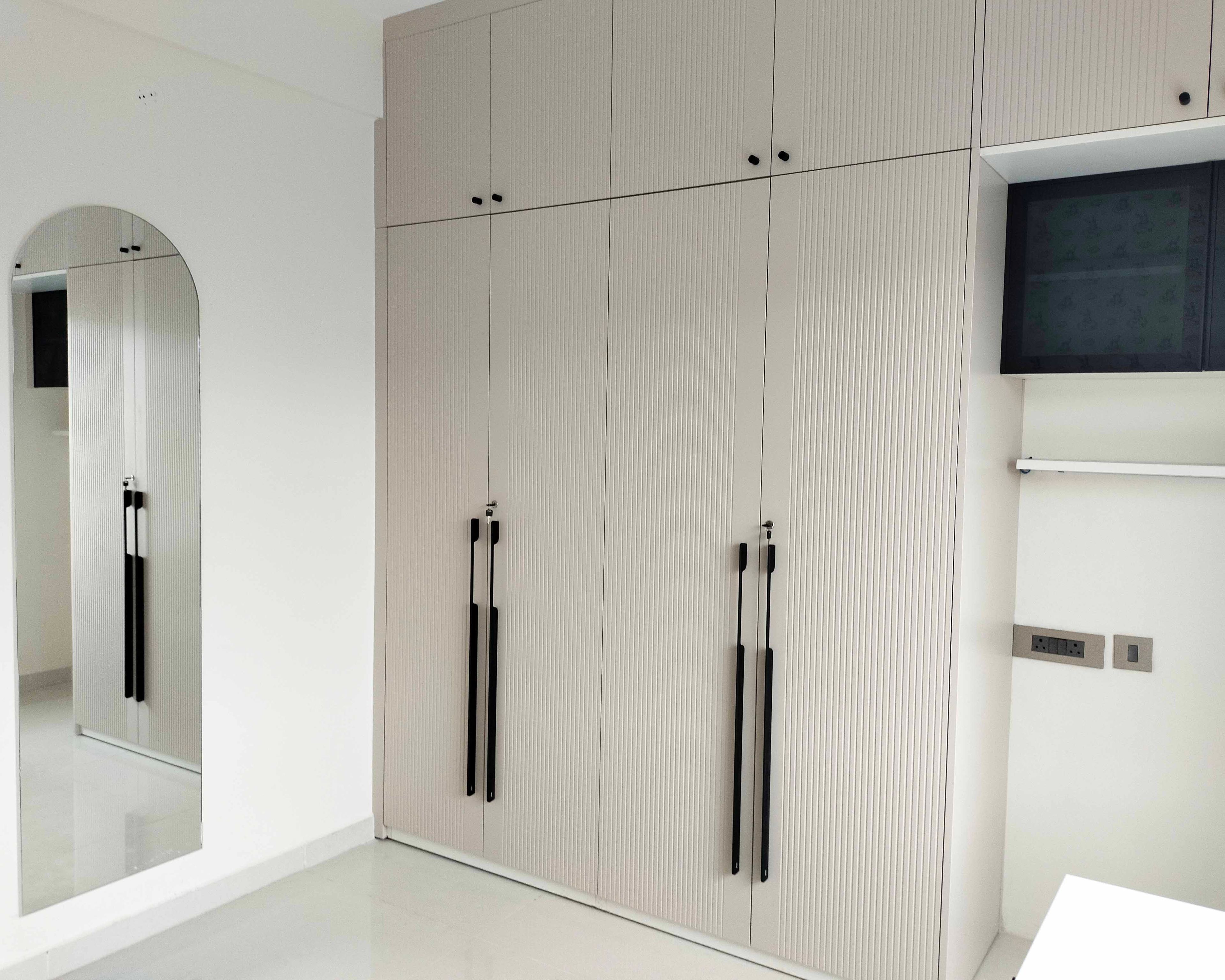 4-Door Beige Swing Wardrobe Design with Loft Unit