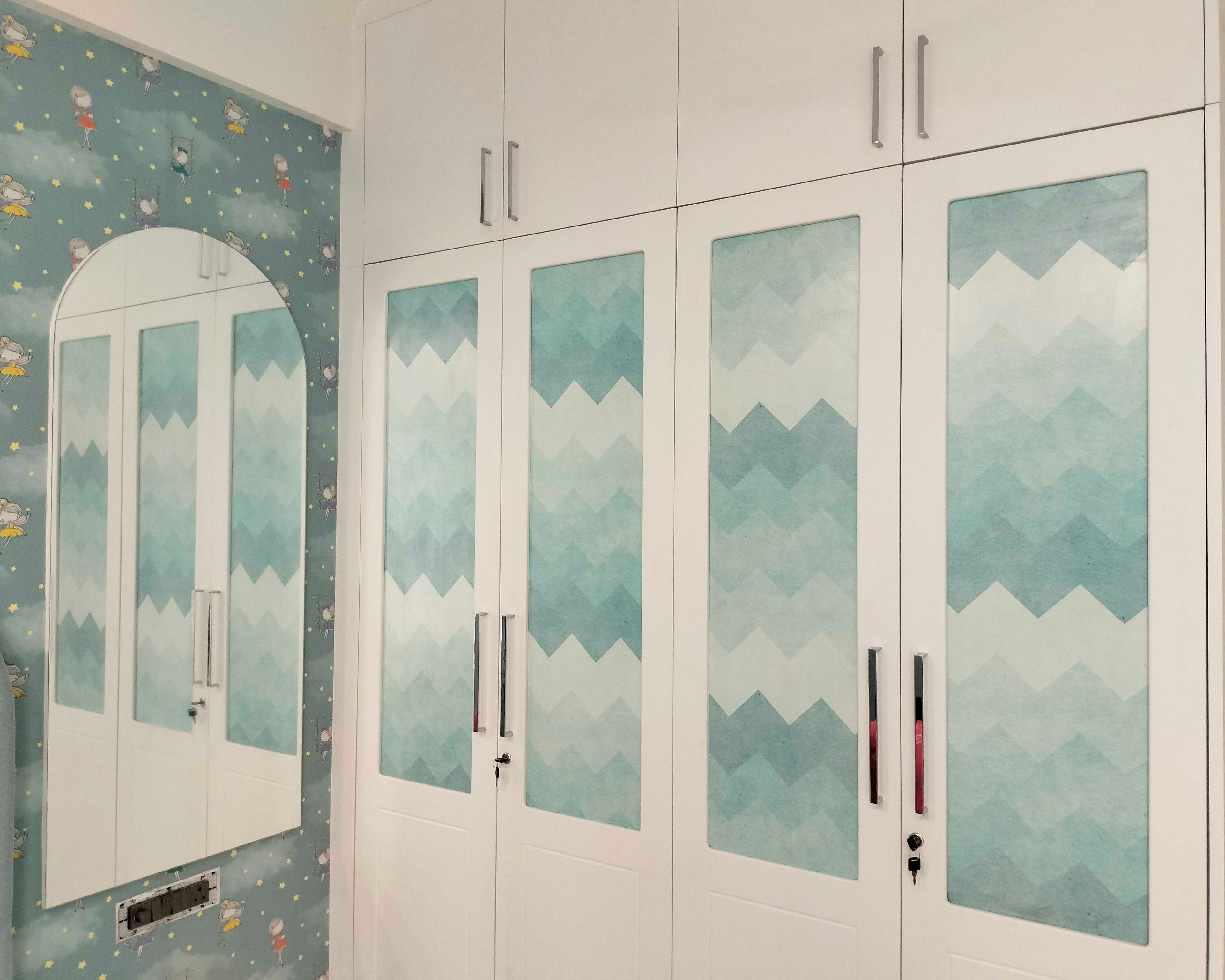 4-Door Off-White with Blue Patterned Shutters Swing Wardrobe Design and Arched Mirror on Blue Wallpaper