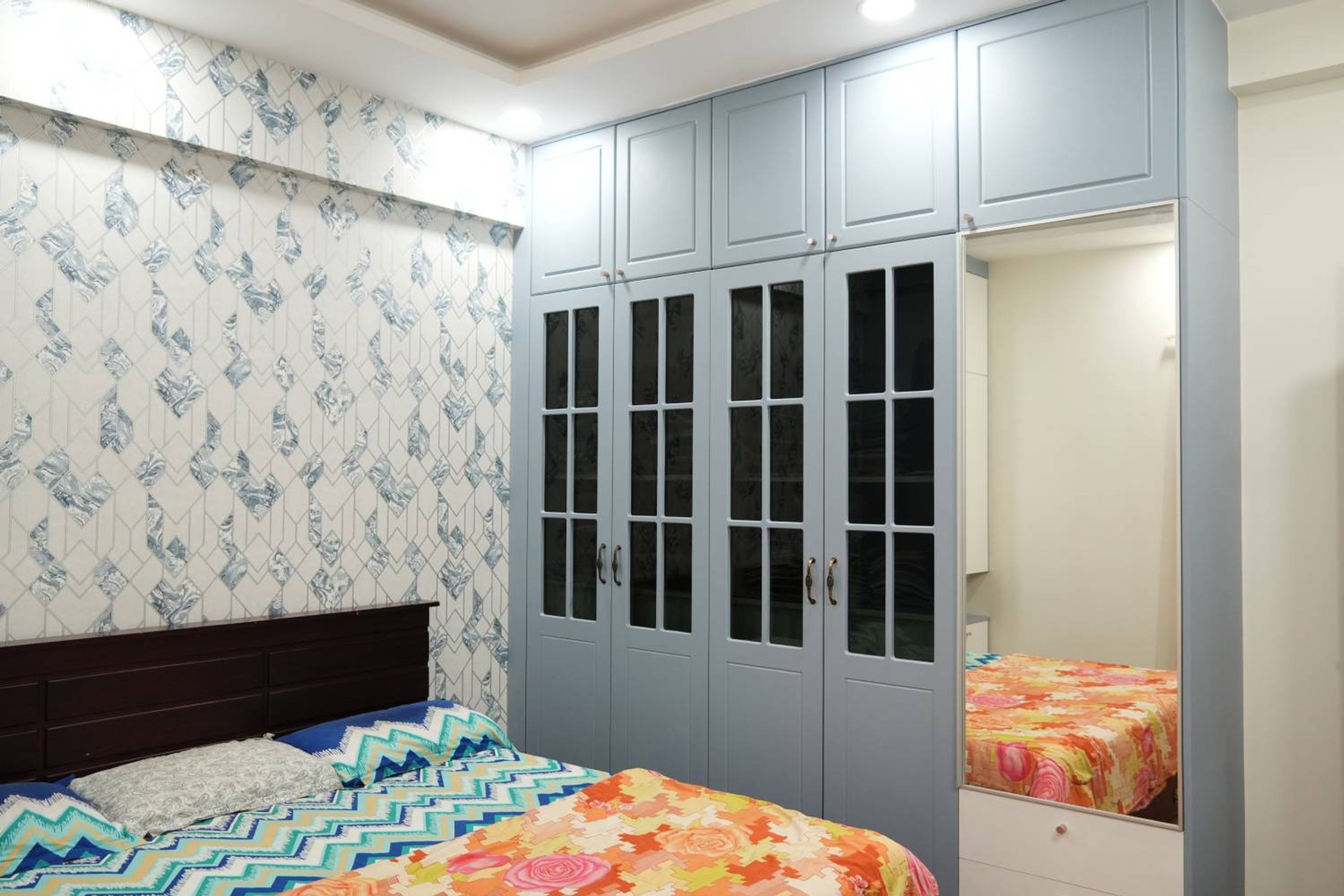 Master Bedroom Design with Wooden Storage and Wardrobe