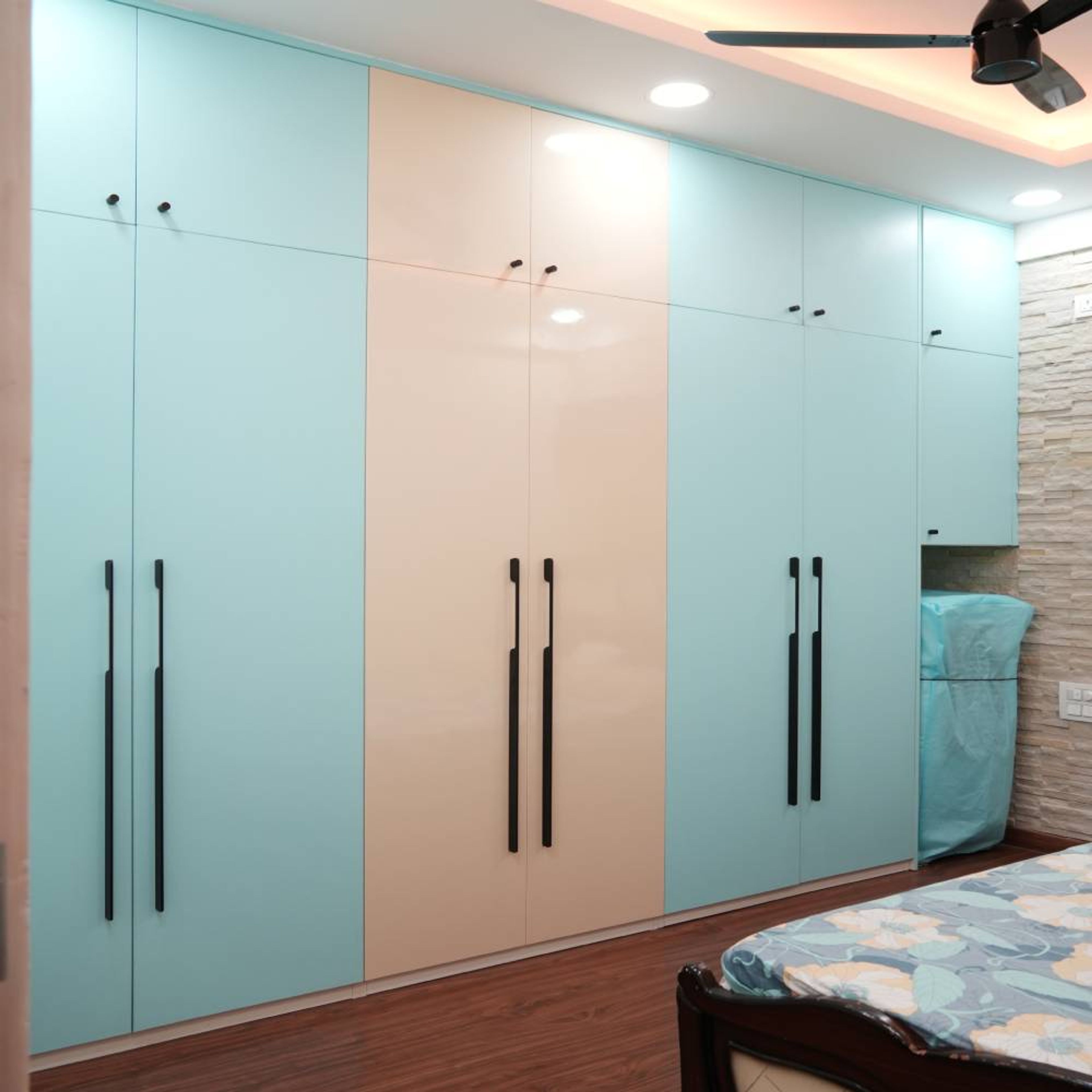 Guest Bedroom Design with Aqua Palette and Stone Accent Wall