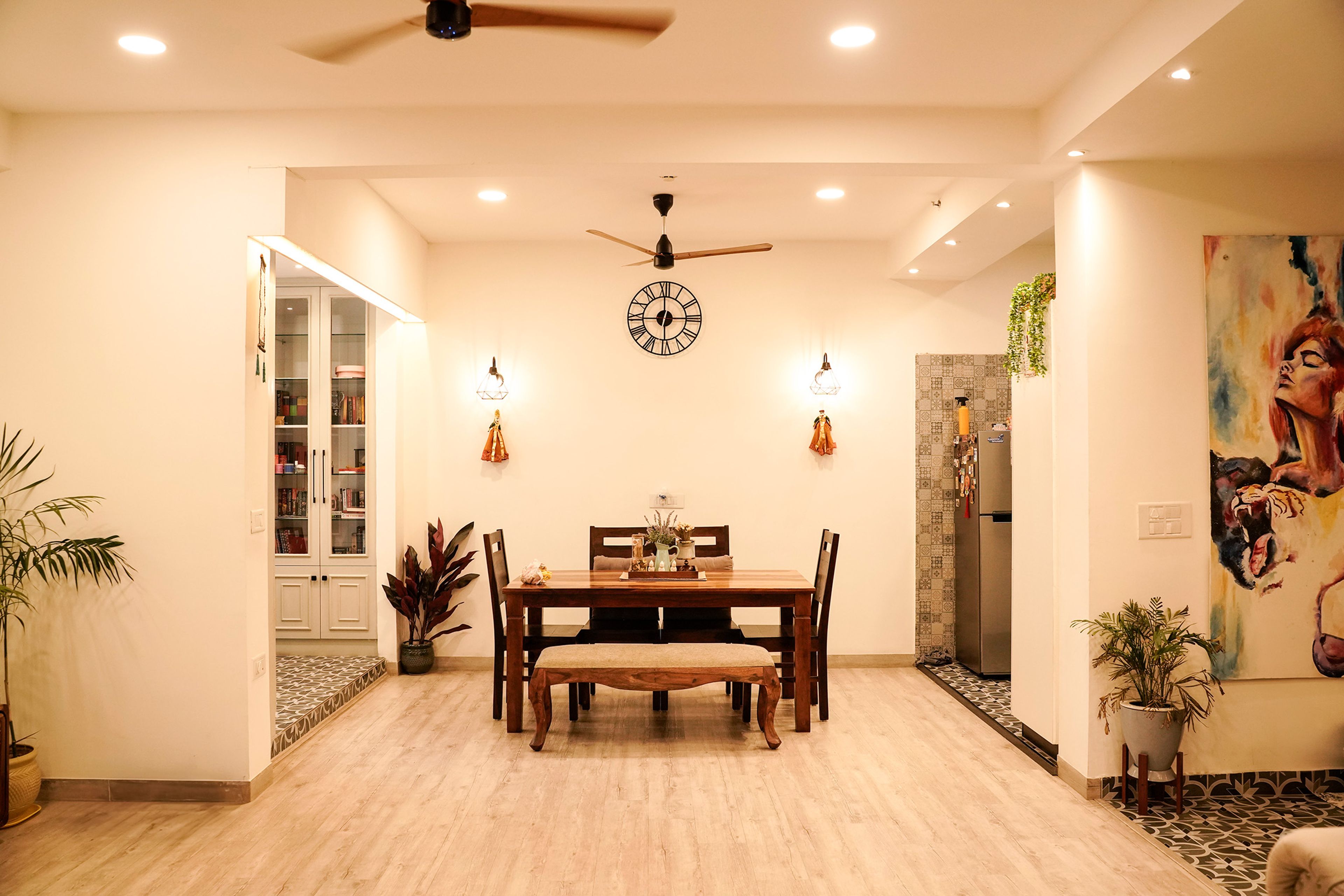 Dining Cum Living Room Design with Wooden Dining Table with 4 Chairs and a Bench