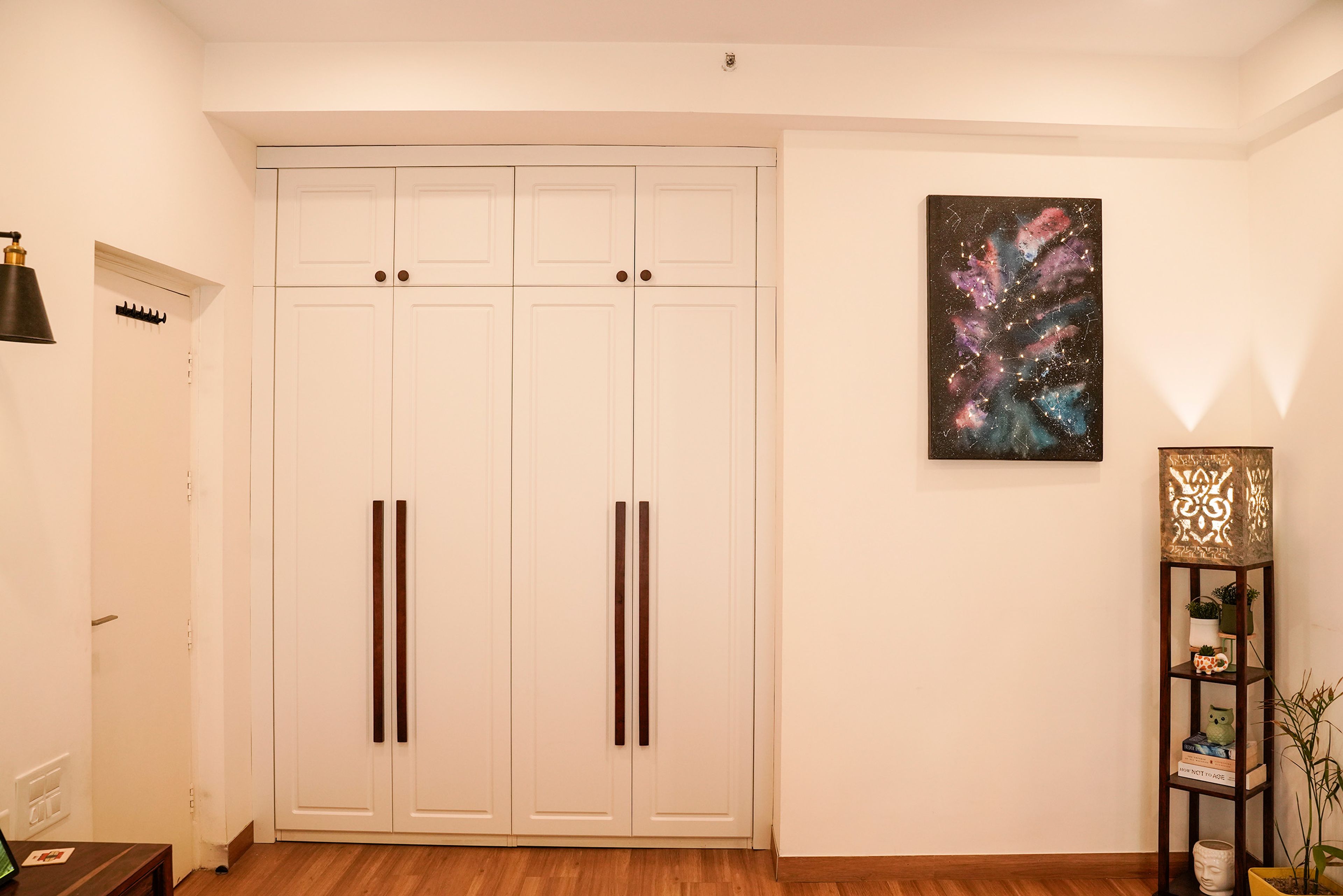 Bedroom Design with 4-Door White Swing Wardrobe