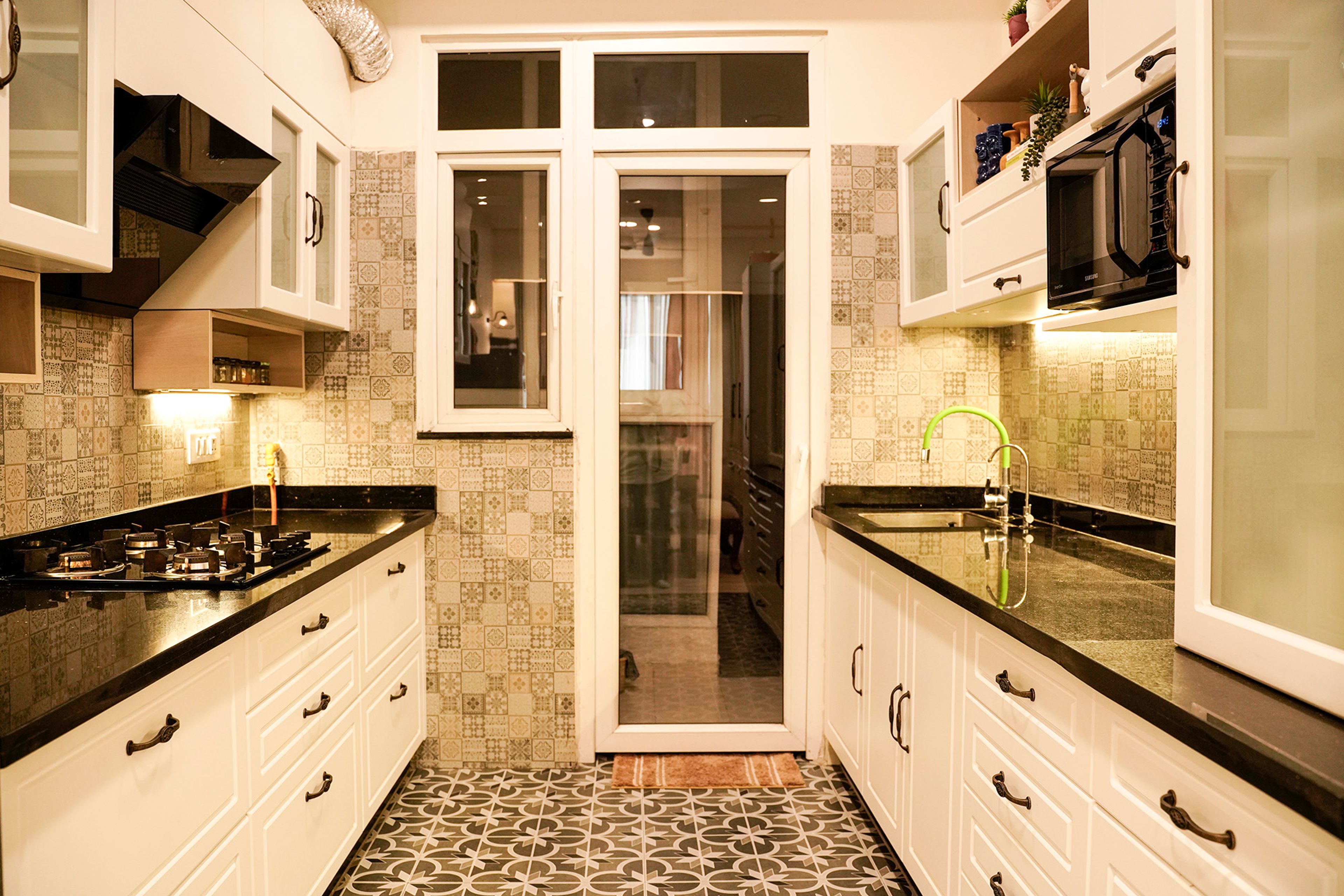Parallel Kitchen with White Units and Moroccan Tile Backsplash