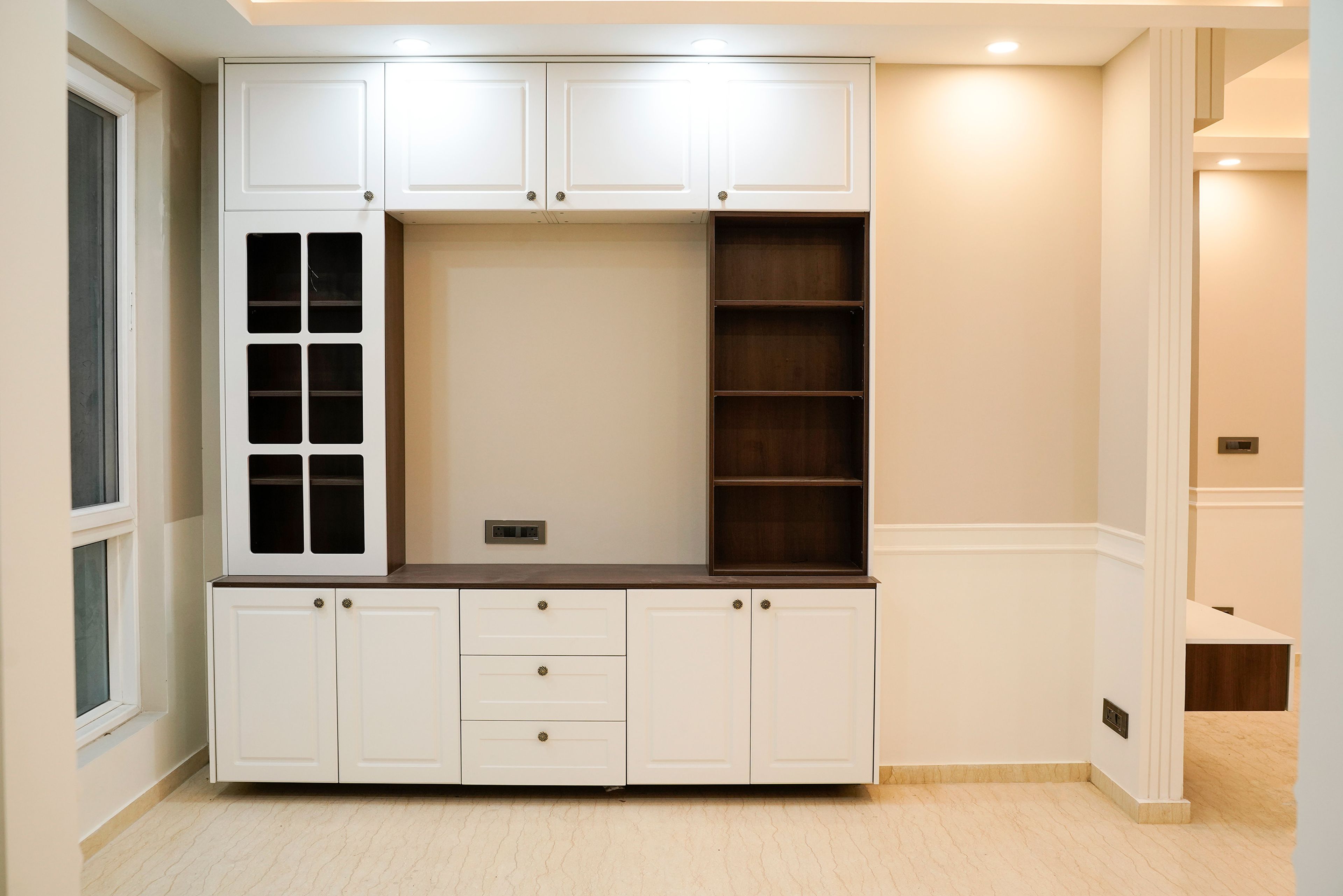 White crockery unit design with tall unit