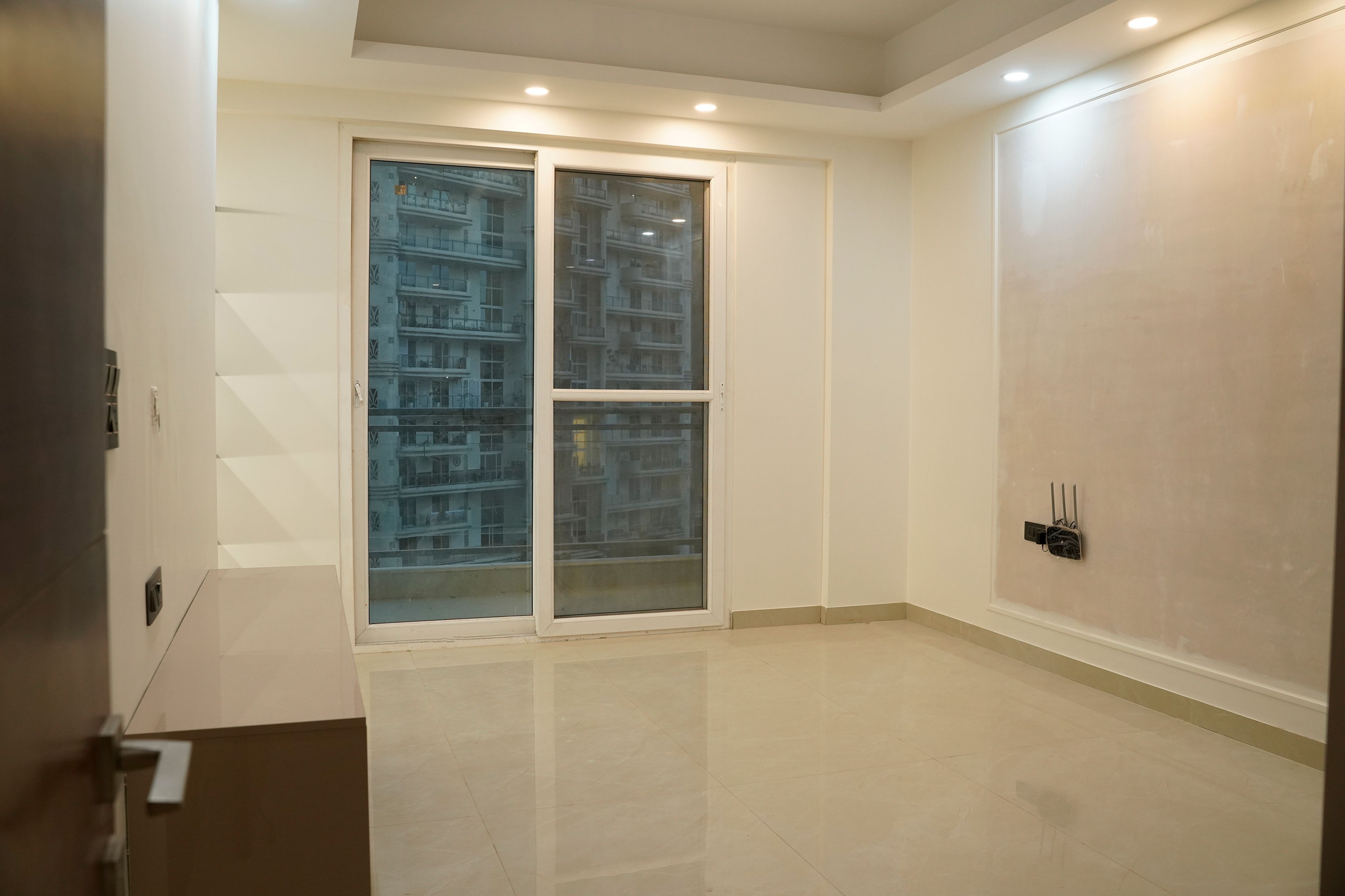 Living room design with cream textured walls