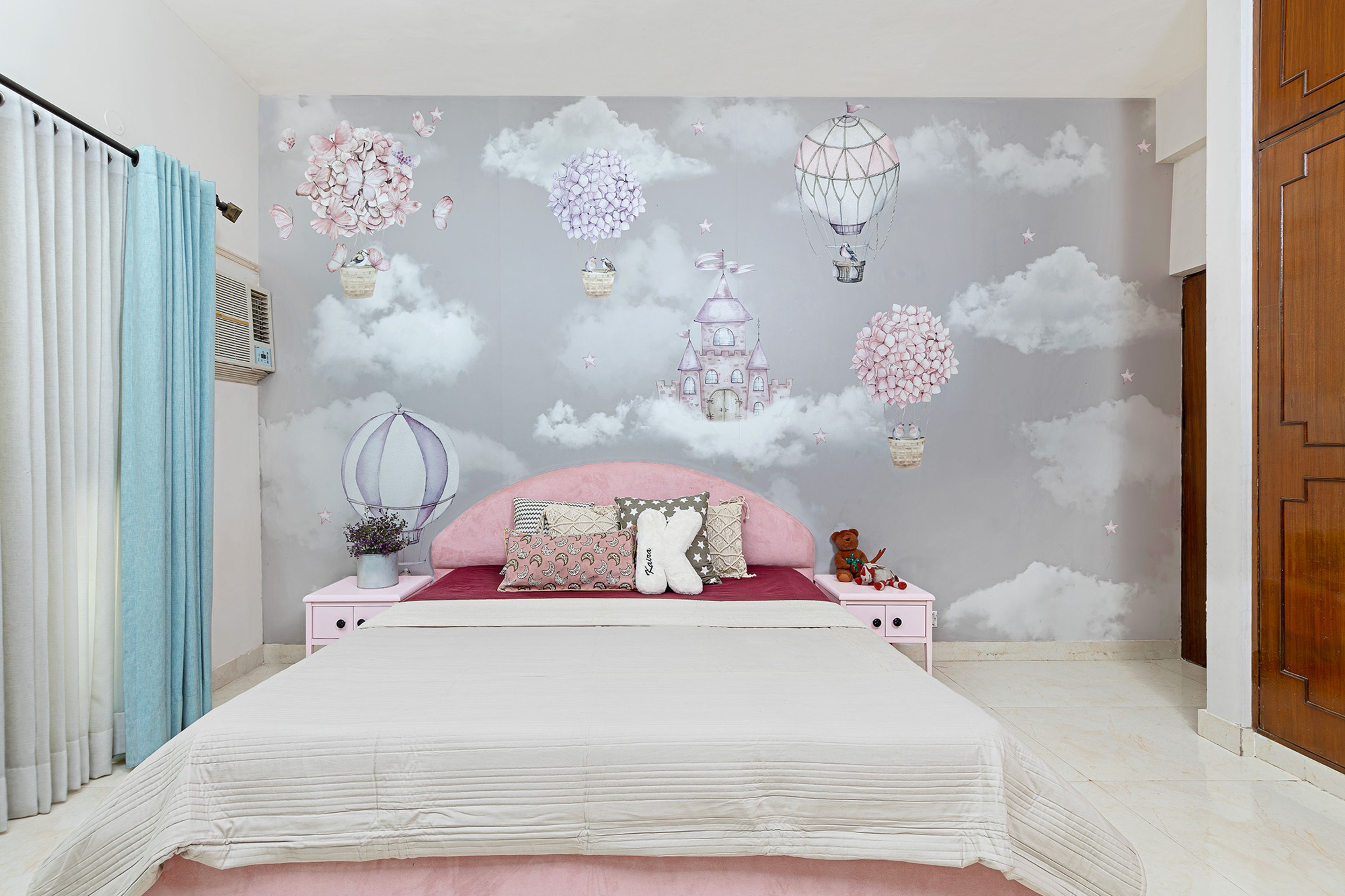 Bedroom Design with Upholstered Headboard Bed and Cloud adn Air Balloon Themed Wall