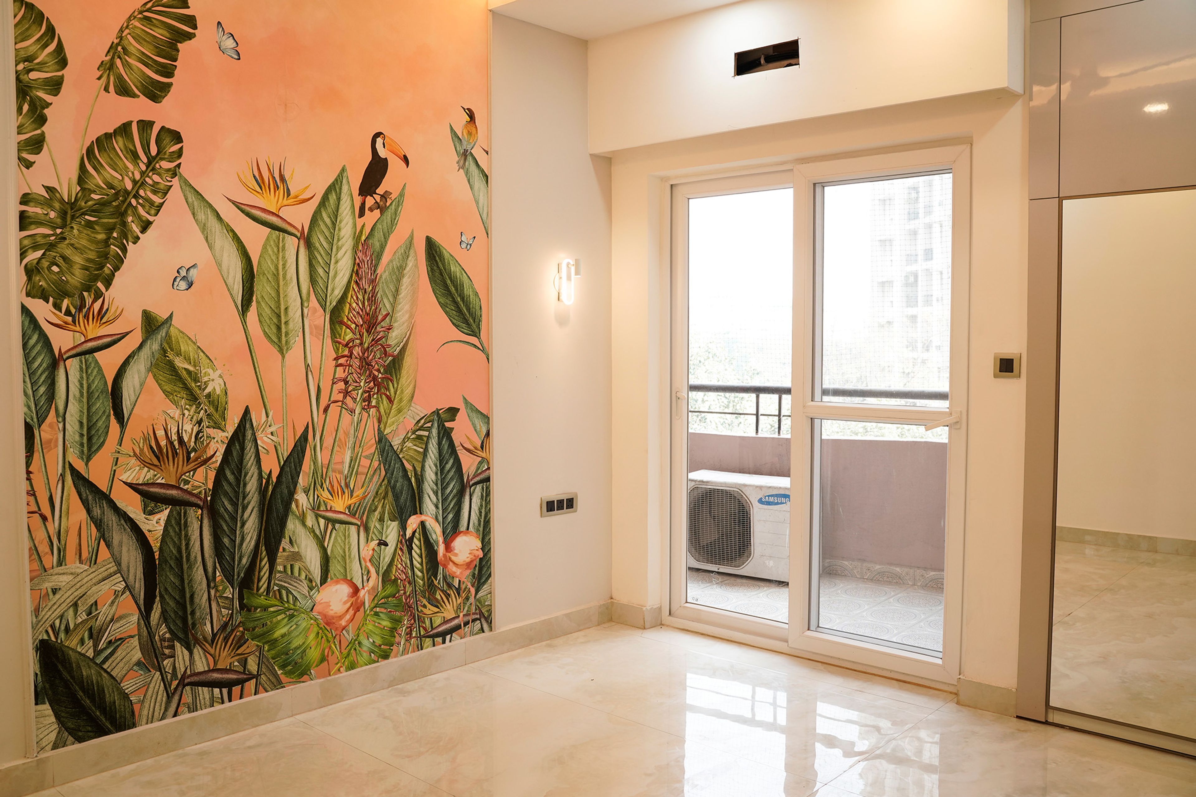 Orange Wall Design with Tropical Theme Plants and Birds
