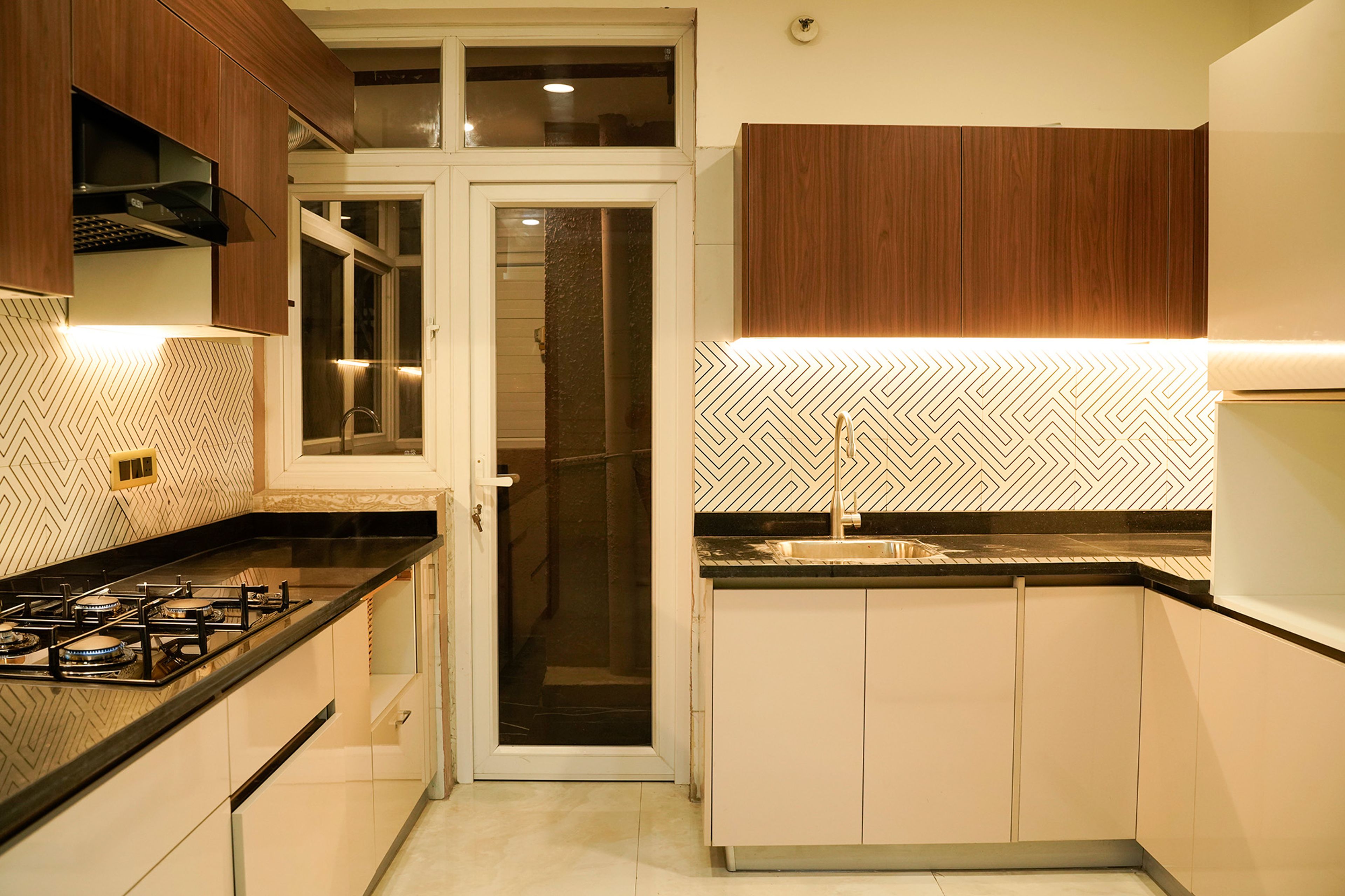 Parallel Kitchen Deign with Wooden Wall Units and Under Cabinet Lighting