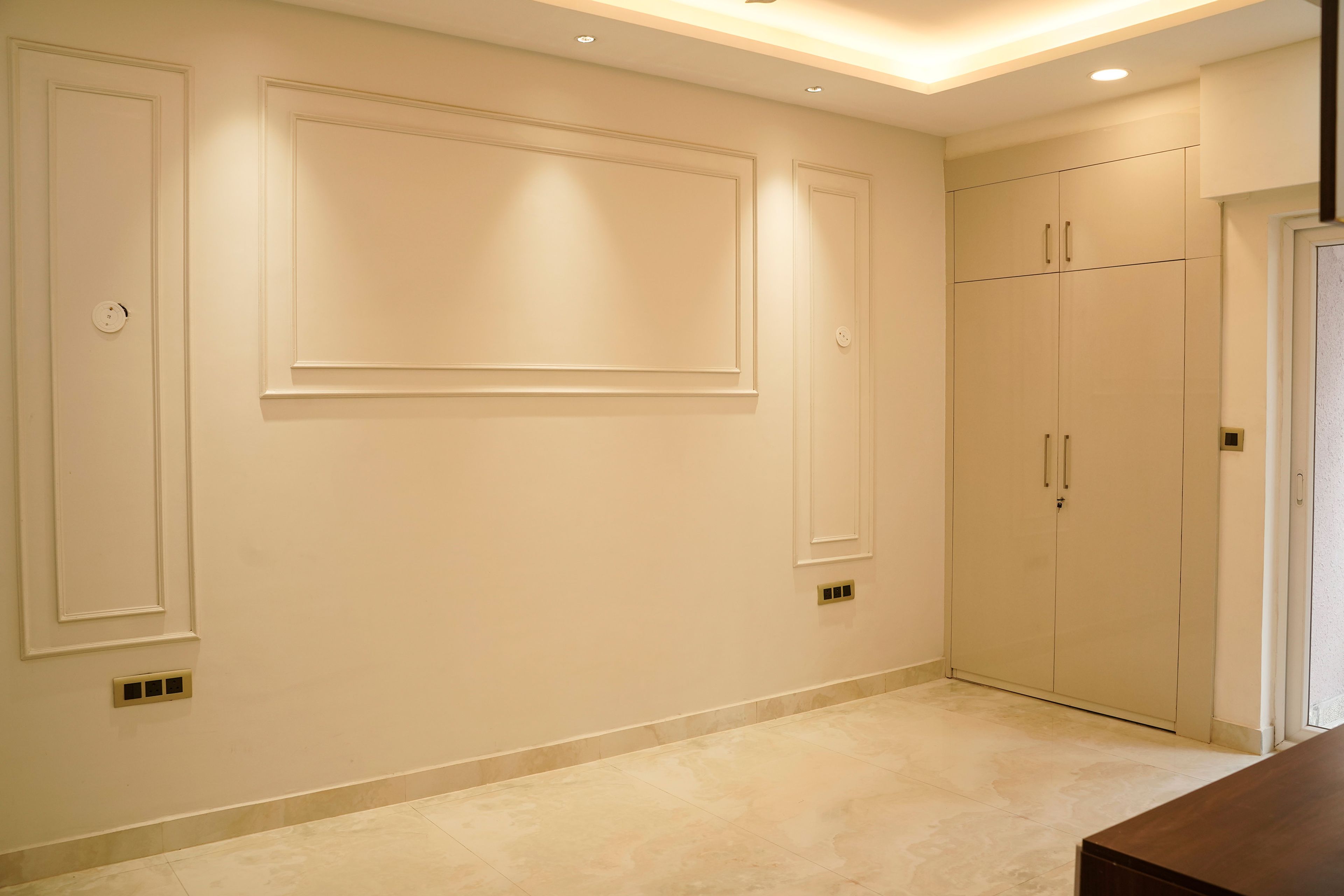 Bedroom Design with Cream Wall with Trims and 2-Door Swing Wardrobe