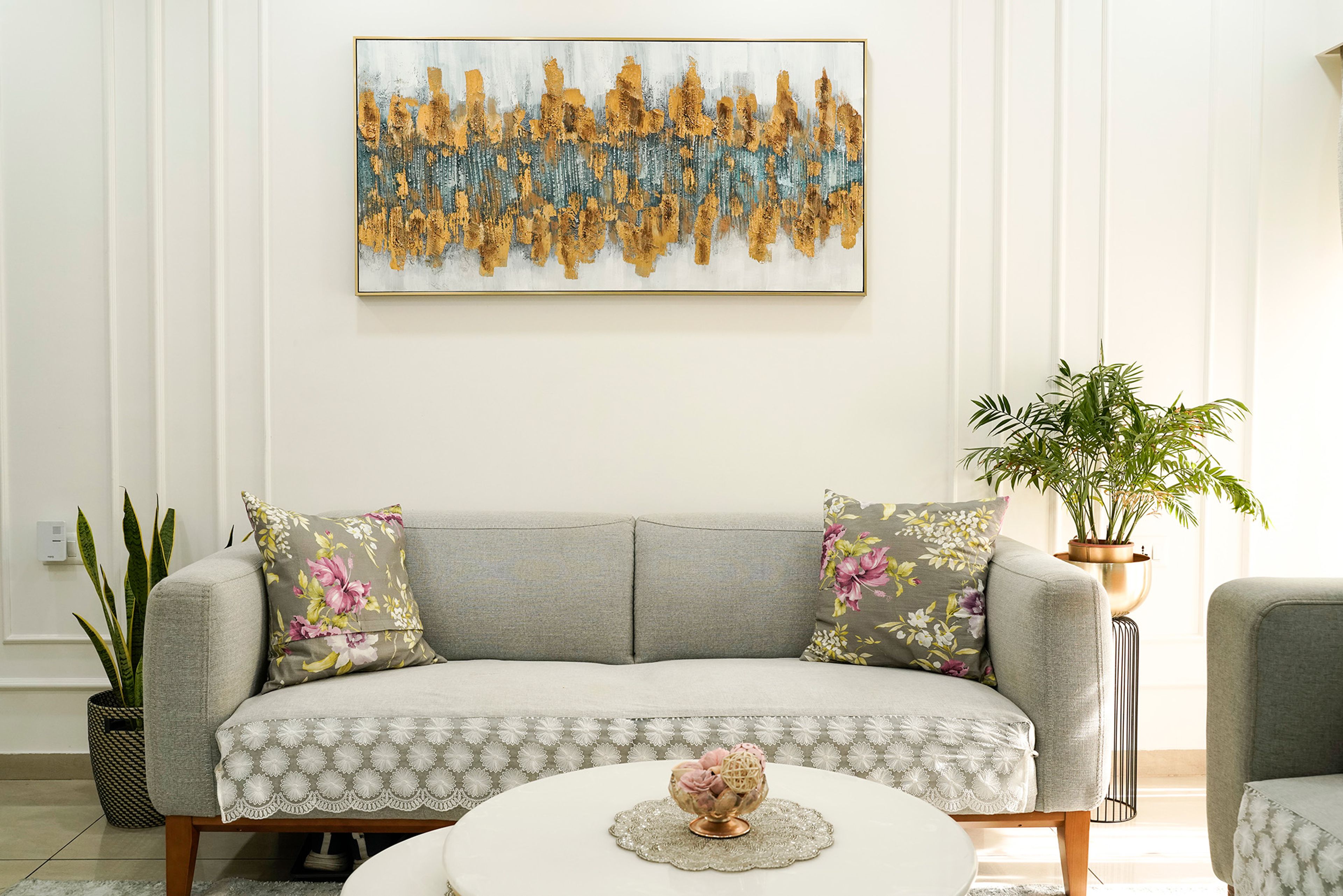 Living Room Design with Grey Sofa and White Wall with Trims