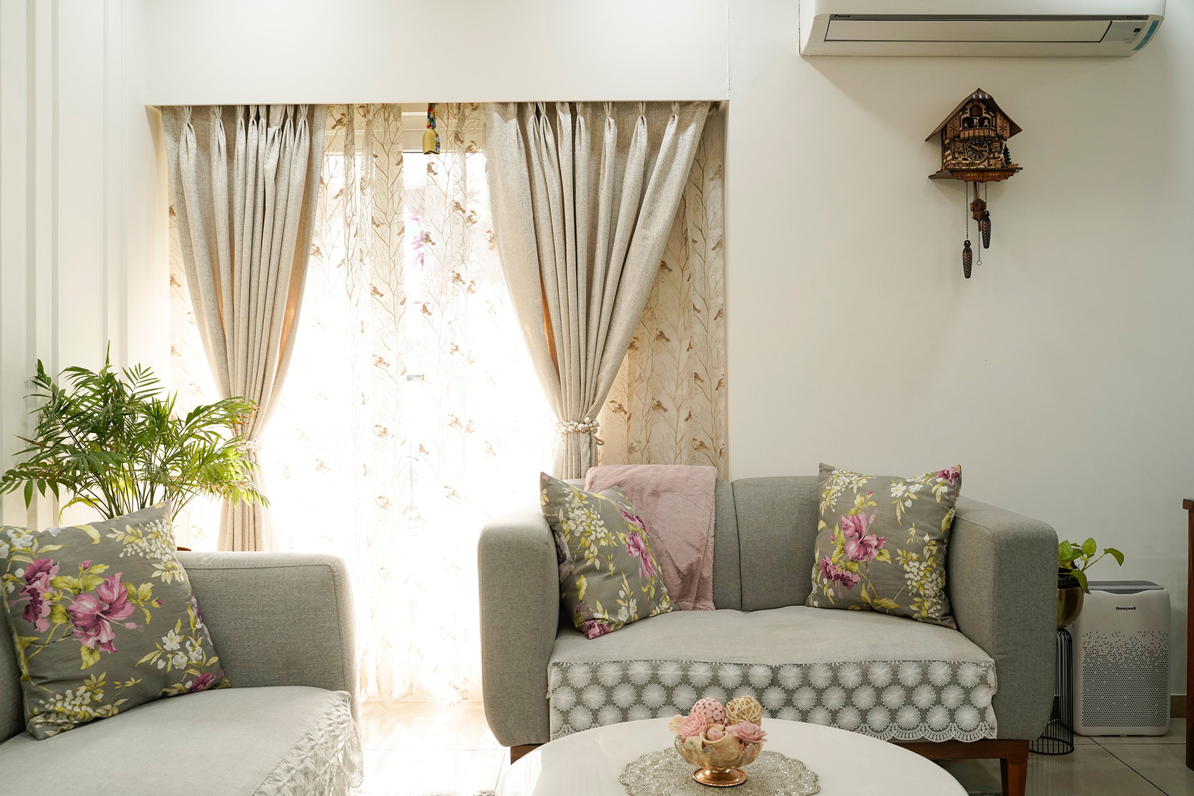 Living Room Design with Grey Sofa and White Wall with Trims