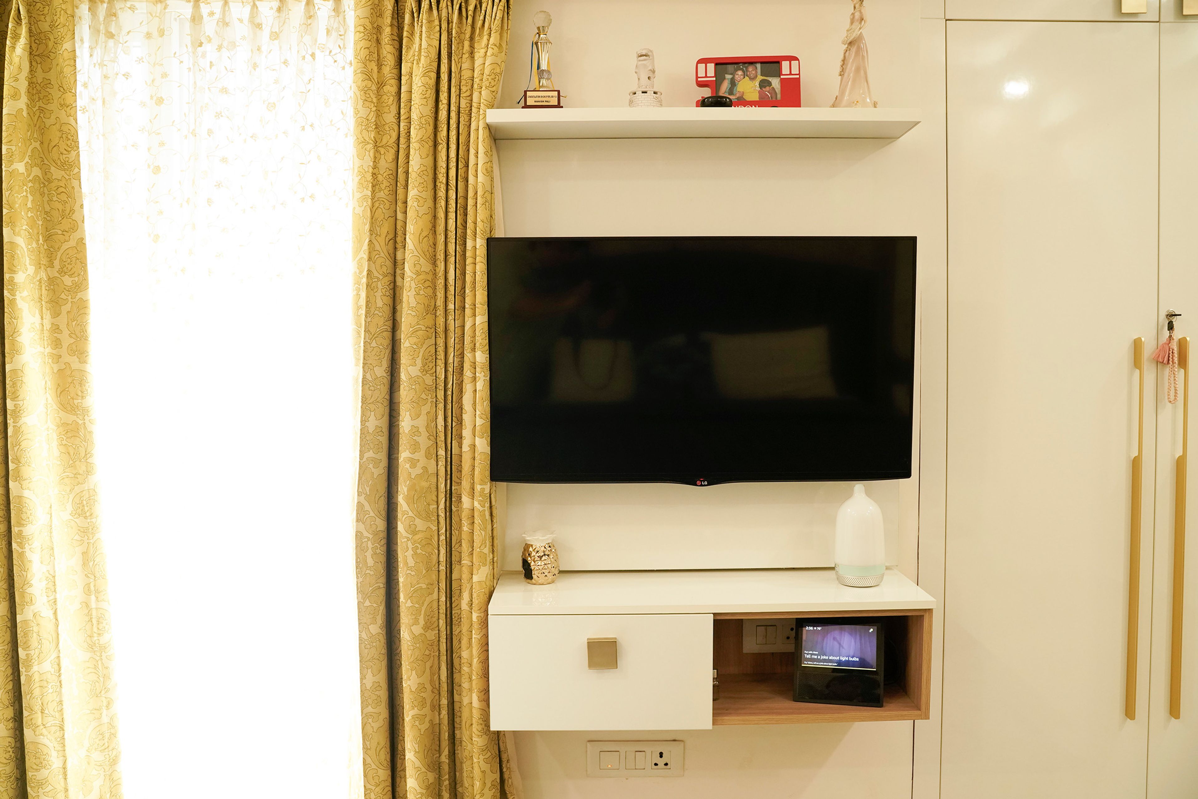 Bedroom Design with White TV Unit