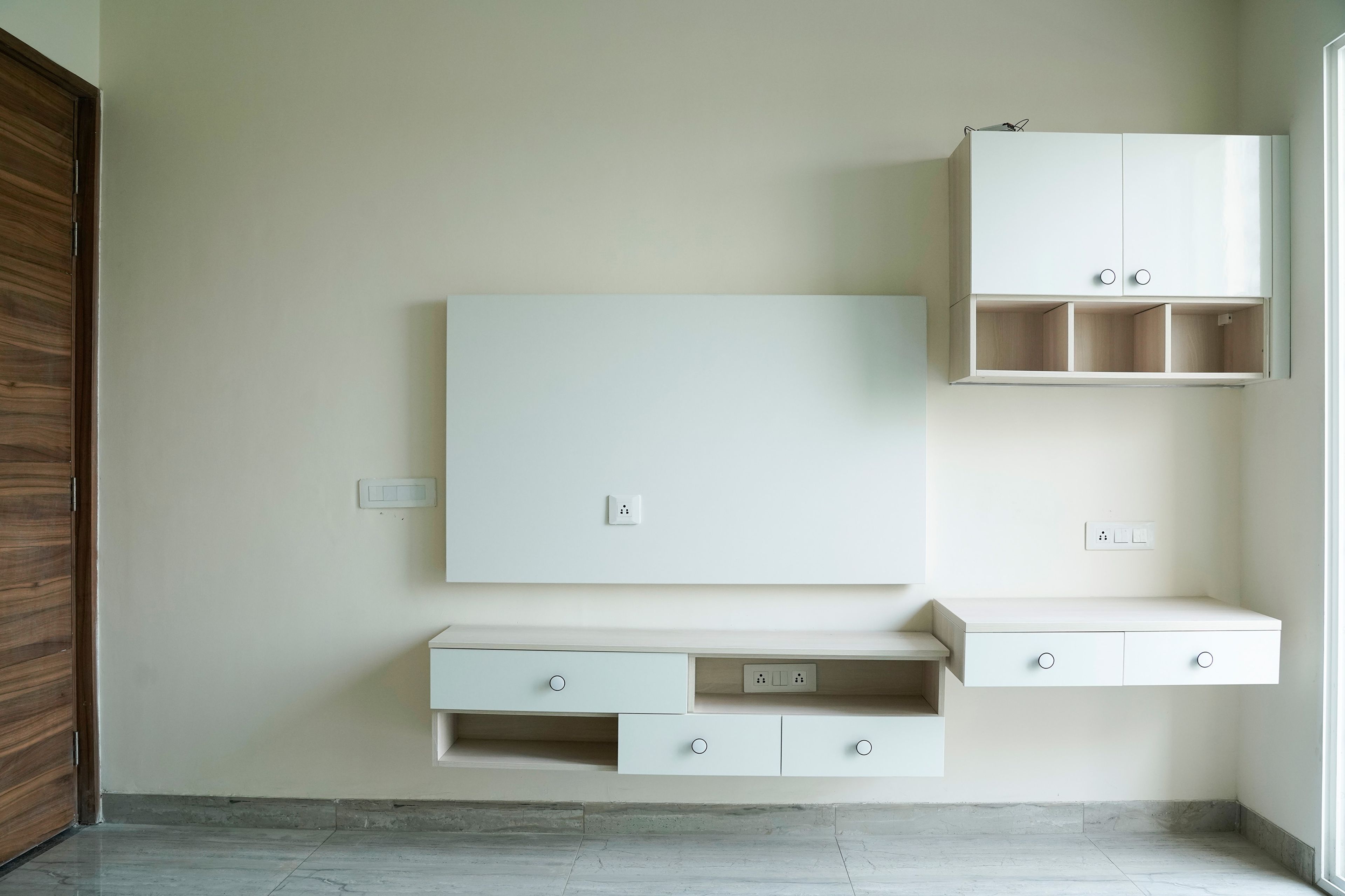 White TV Unit Design with Drawers and Wall Cabinets