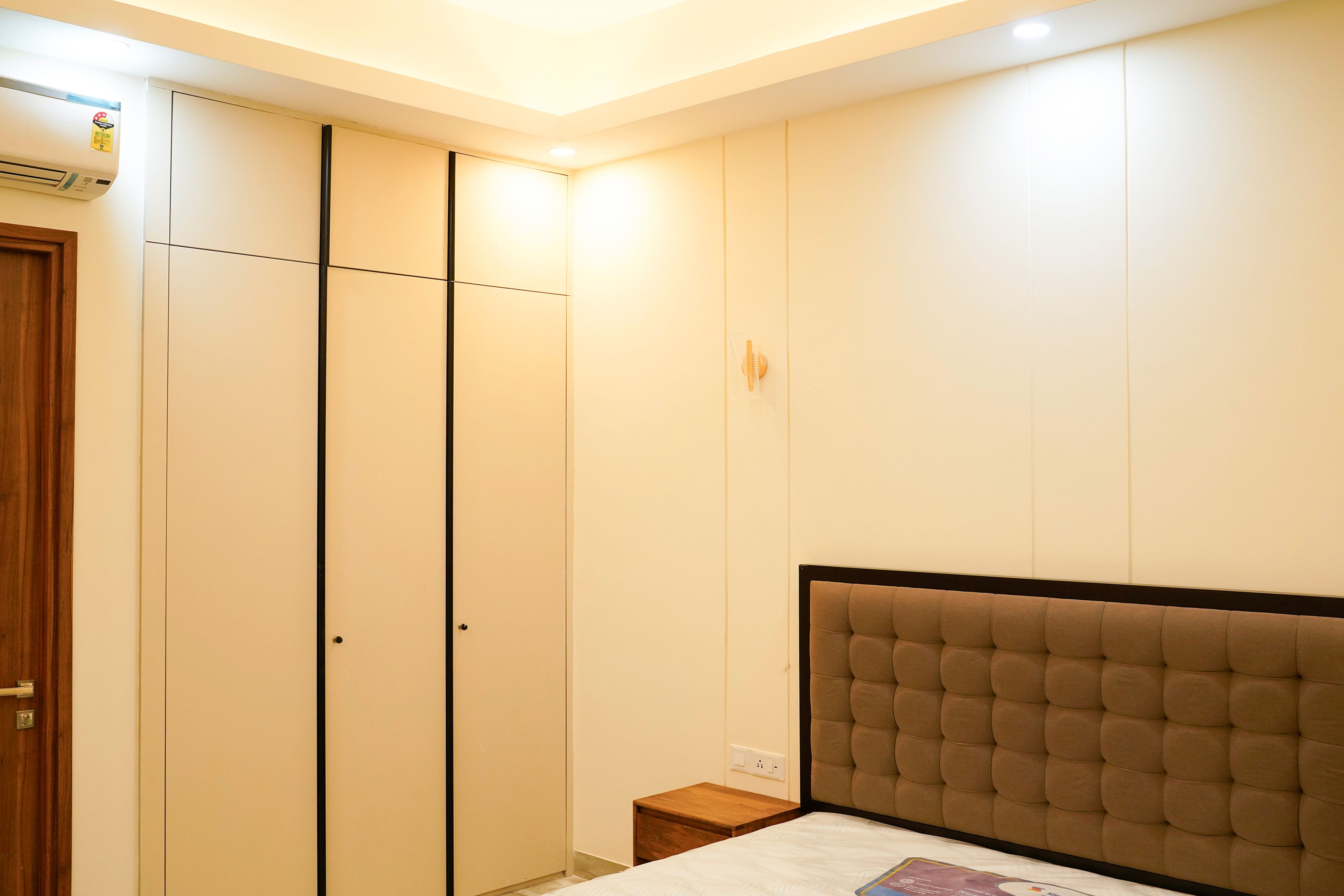 Bedroom Design with Cream 3-Door Swing Wardrobe